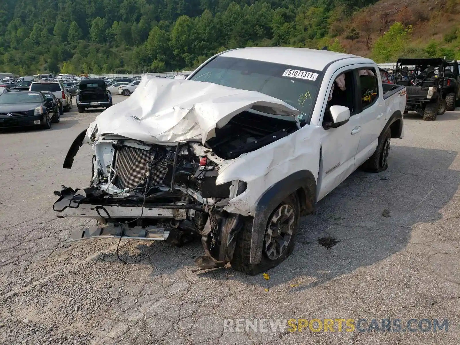 2 Photograph of a damaged car 5TFCZ5AN8KX207806 TOYOTA TACOMA 2019