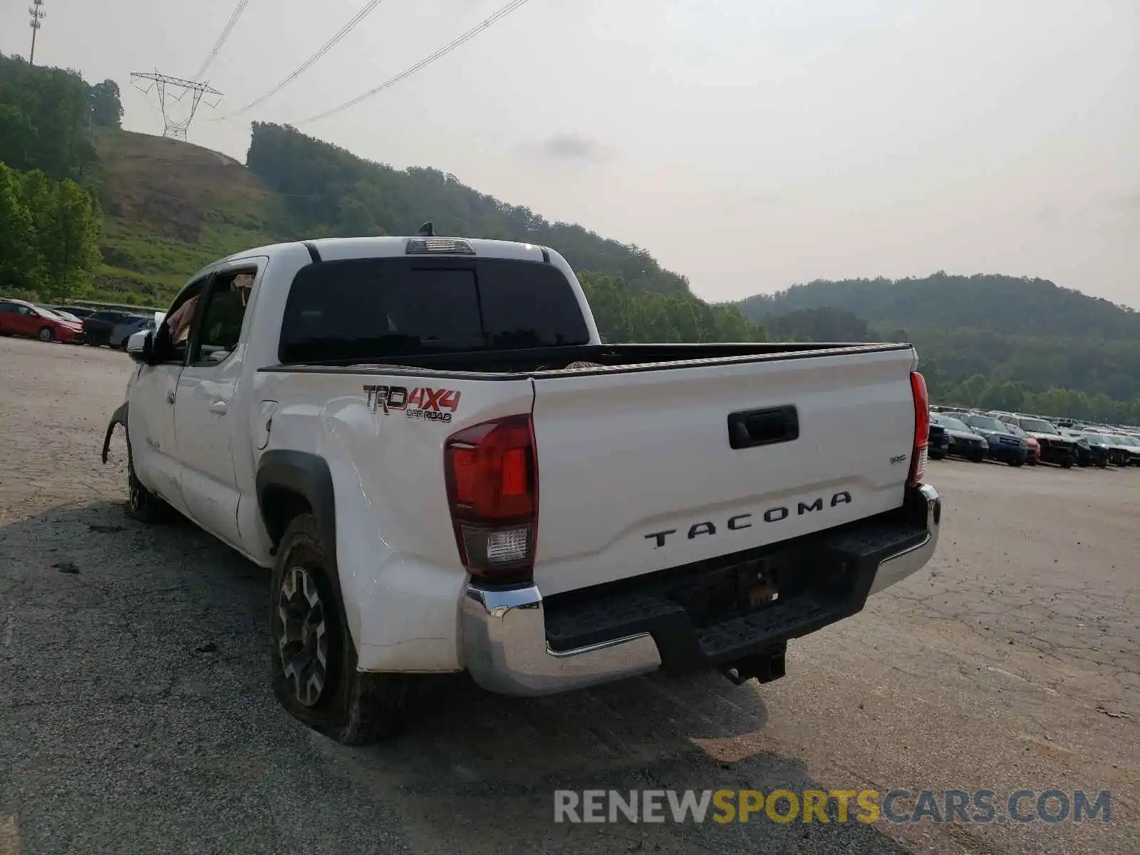 3 Photograph of a damaged car 5TFCZ5AN8KX207806 TOYOTA TACOMA 2019