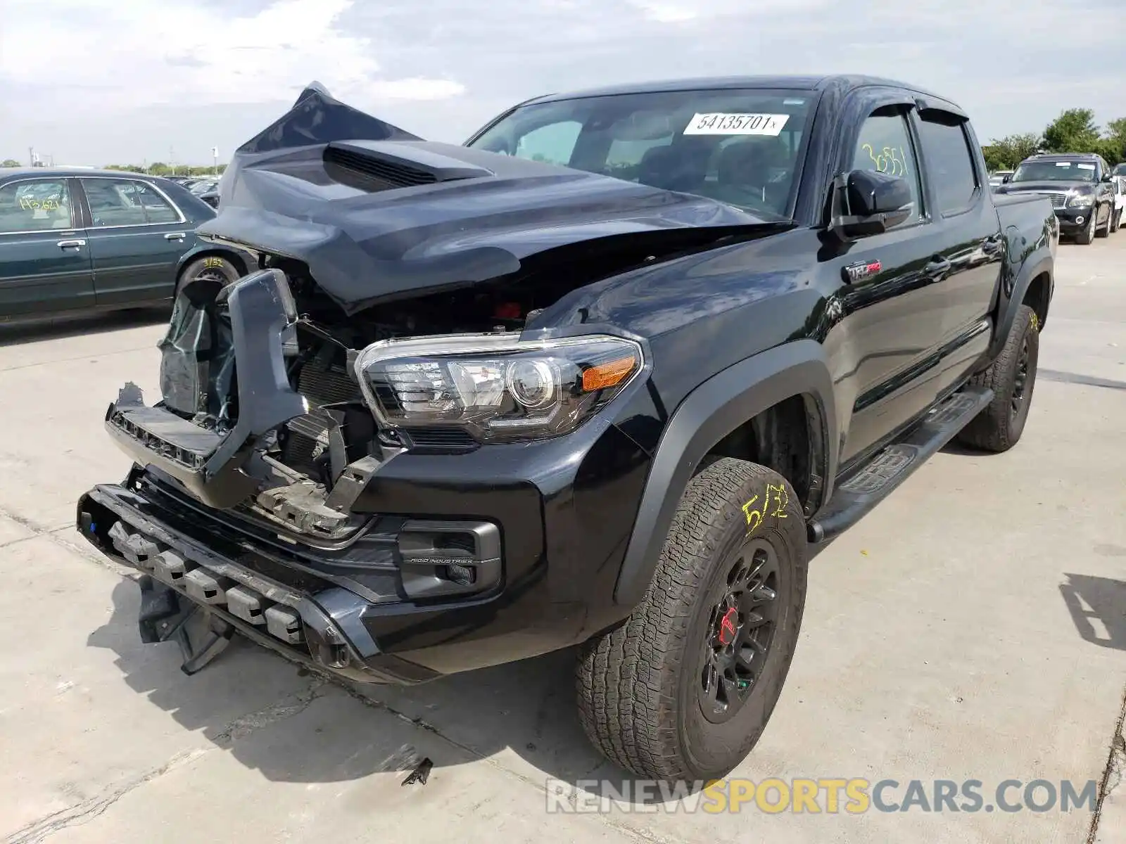 2 Photograph of a damaged car 5TFCZ5AN8KX207868 TOYOTA TACOMA 2019