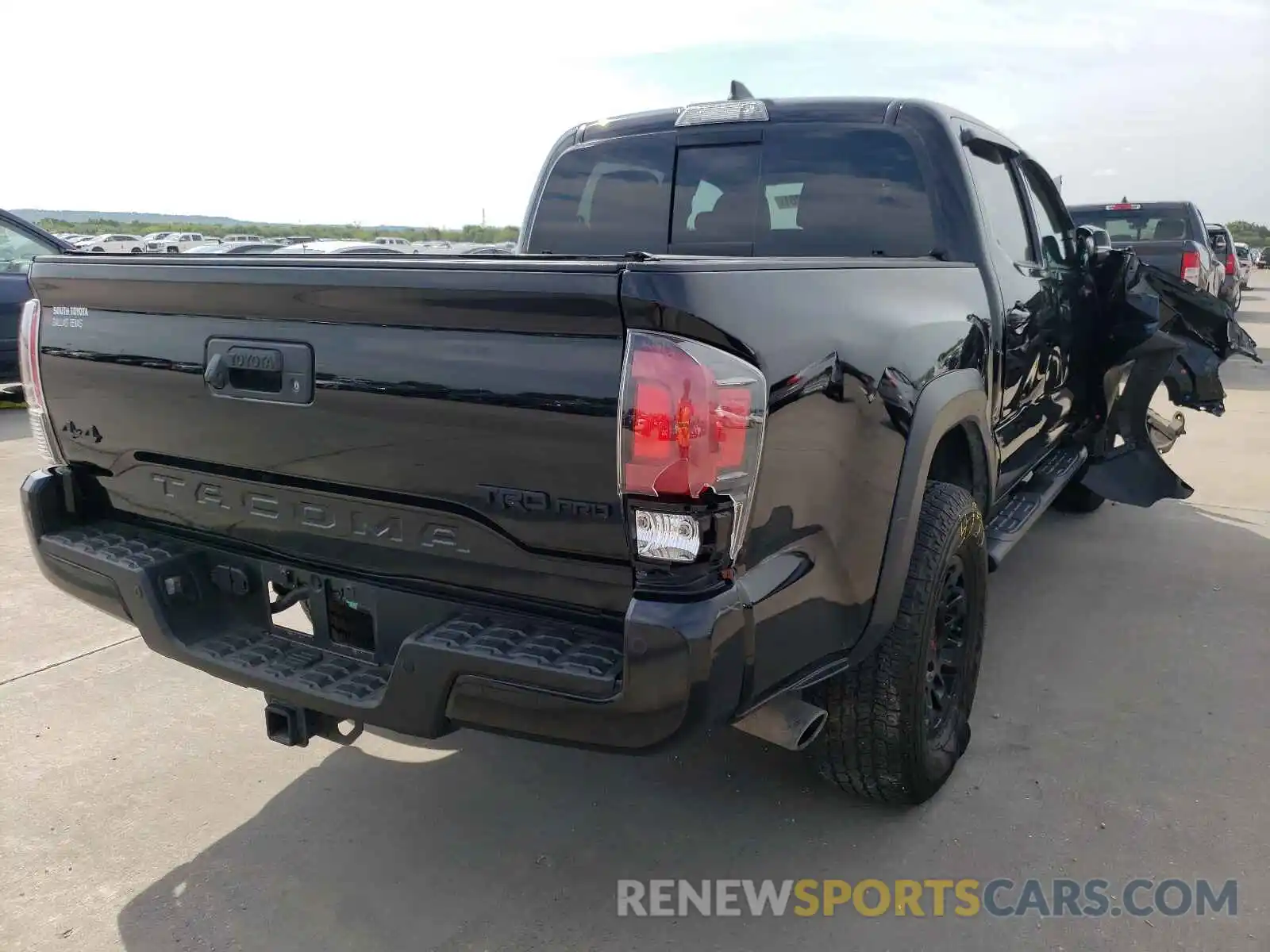 4 Photograph of a damaged car 5TFCZ5AN8KX207868 TOYOTA TACOMA 2019