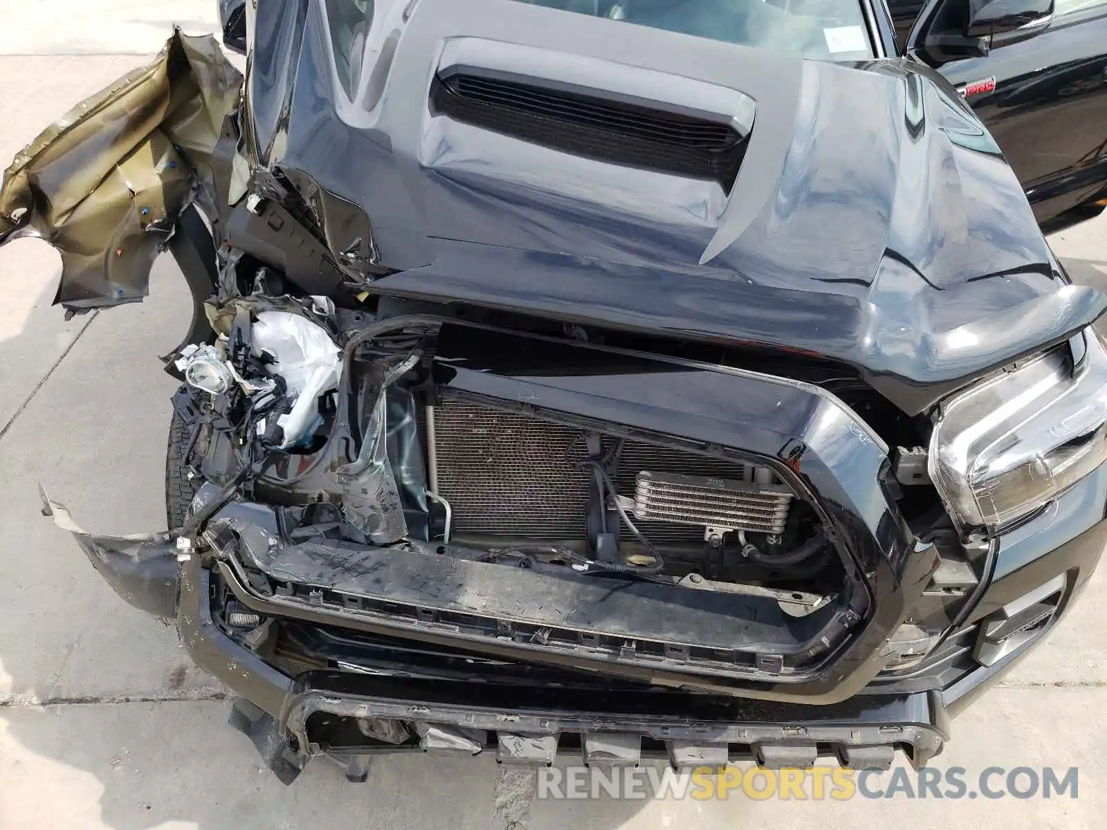 7 Photograph of a damaged car 5TFCZ5AN8KX207868 TOYOTA TACOMA 2019