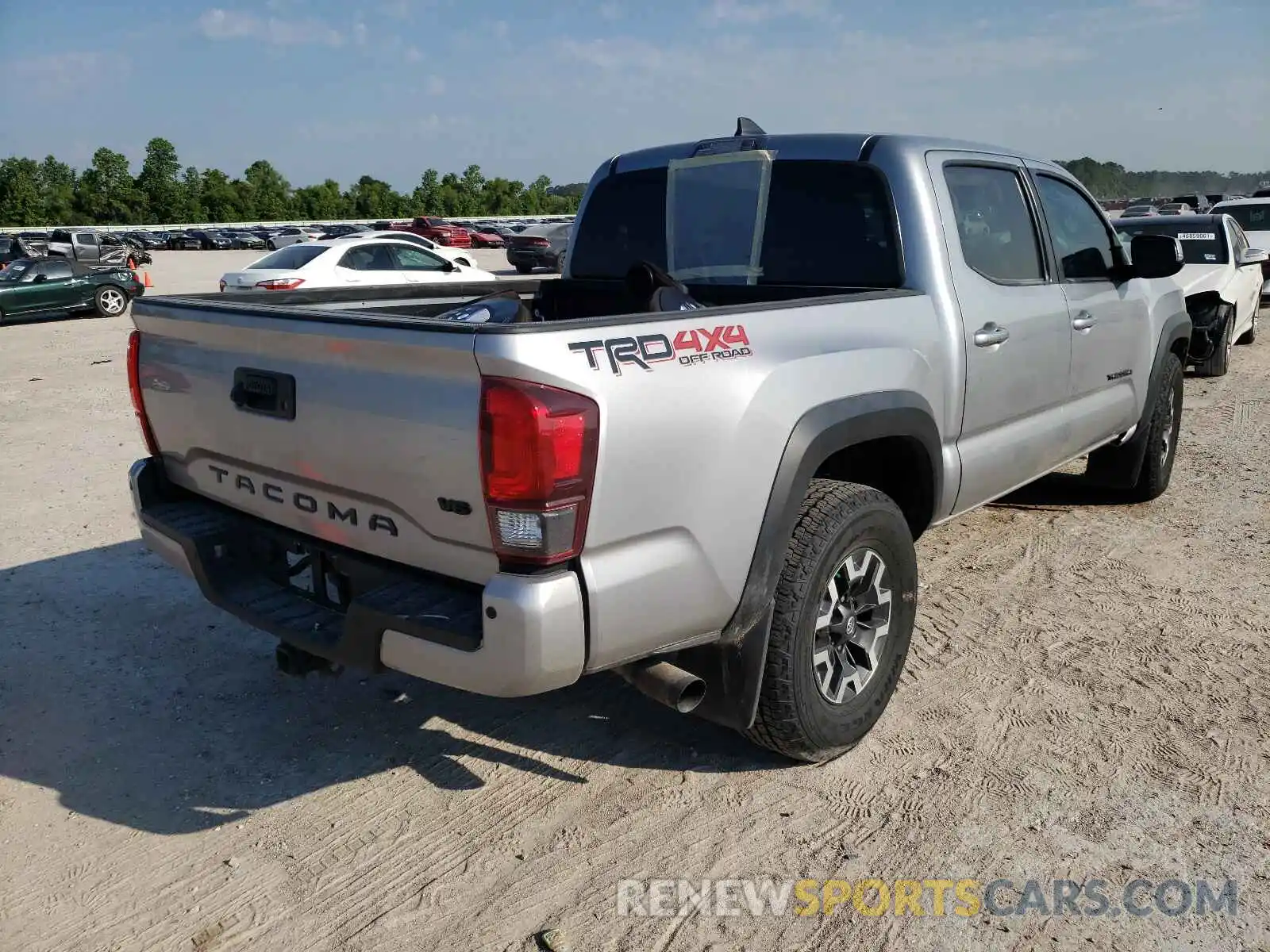 4 Photograph of a damaged car 5TFCZ5AN8KX209278 TOYOTA TACOMA 2019