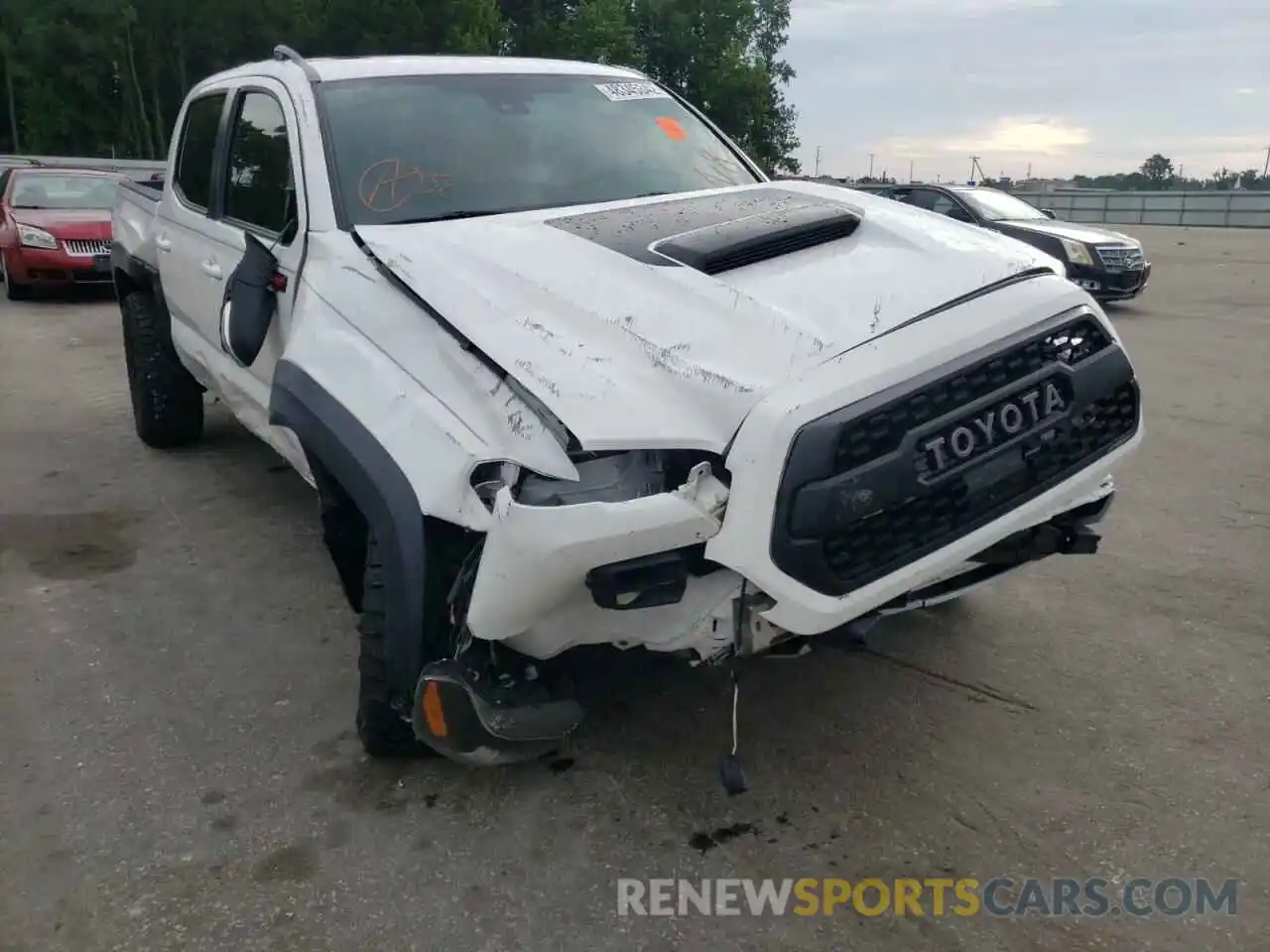 9 Photograph of a damaged car 5TFCZ5AN8KX210012 TOYOTA TACOMA 2019