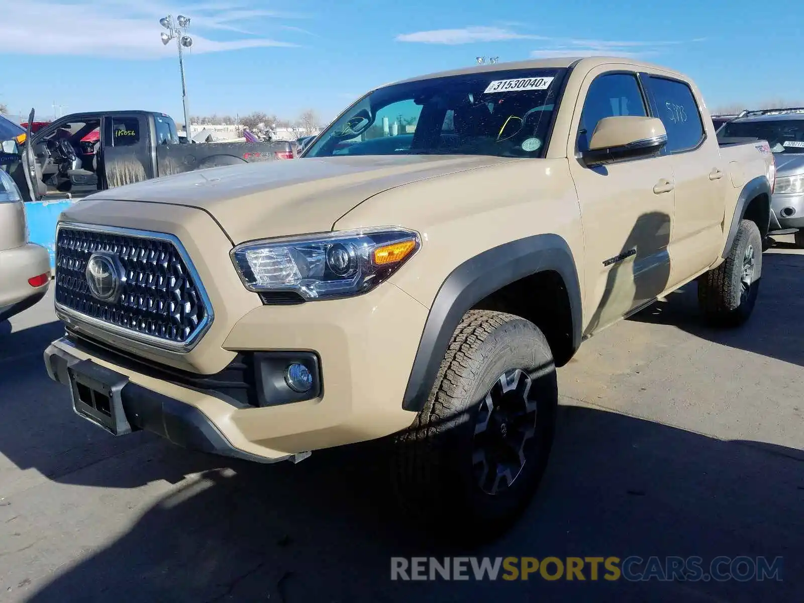 2 Photograph of a damaged car 5TFCZ5AN8KX210544 TOYOTA TACOMA 2019