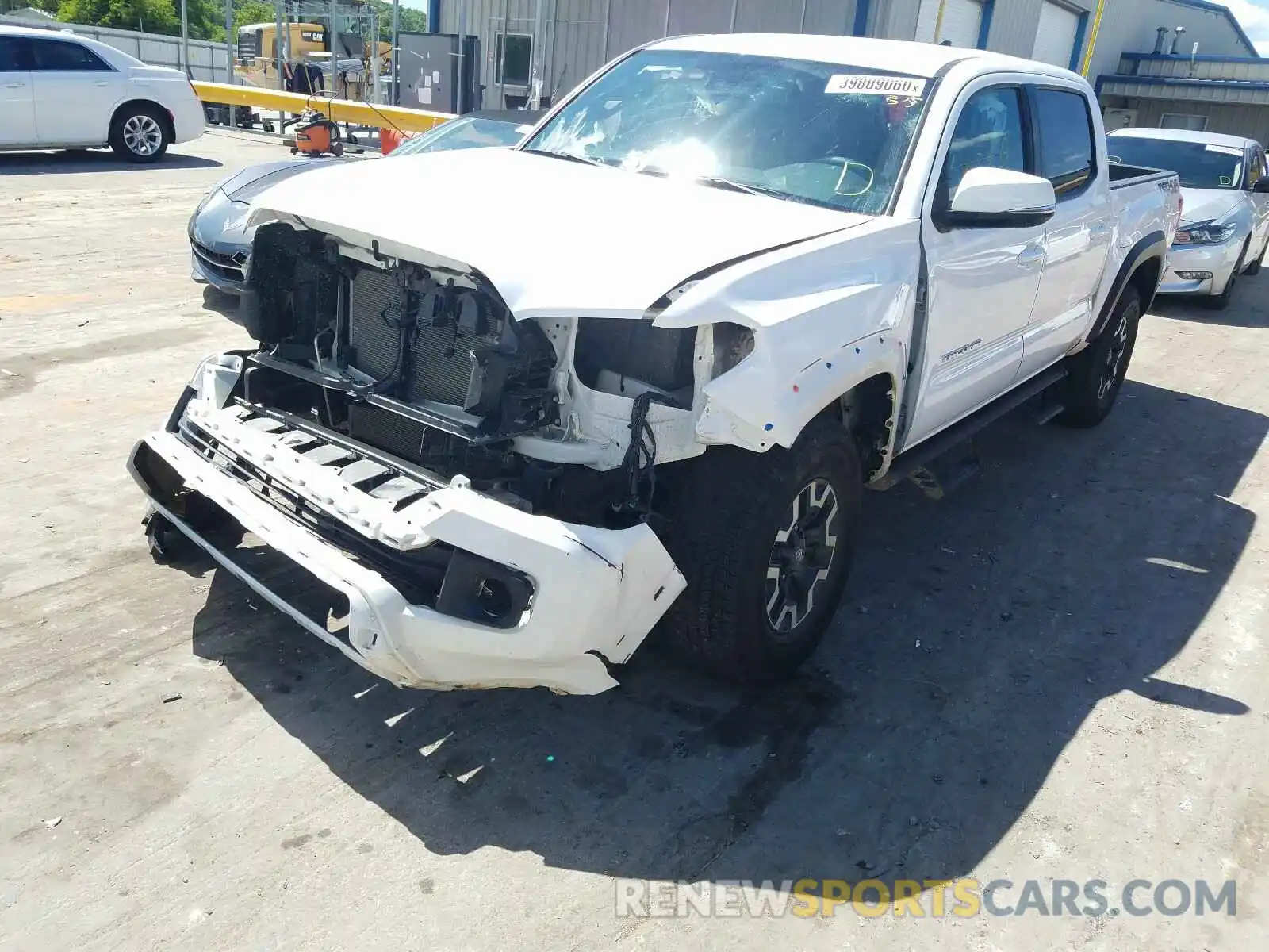 2 Photograph of a damaged car 5TFCZ5AN8KX210625 TOYOTA TACOMA 2019