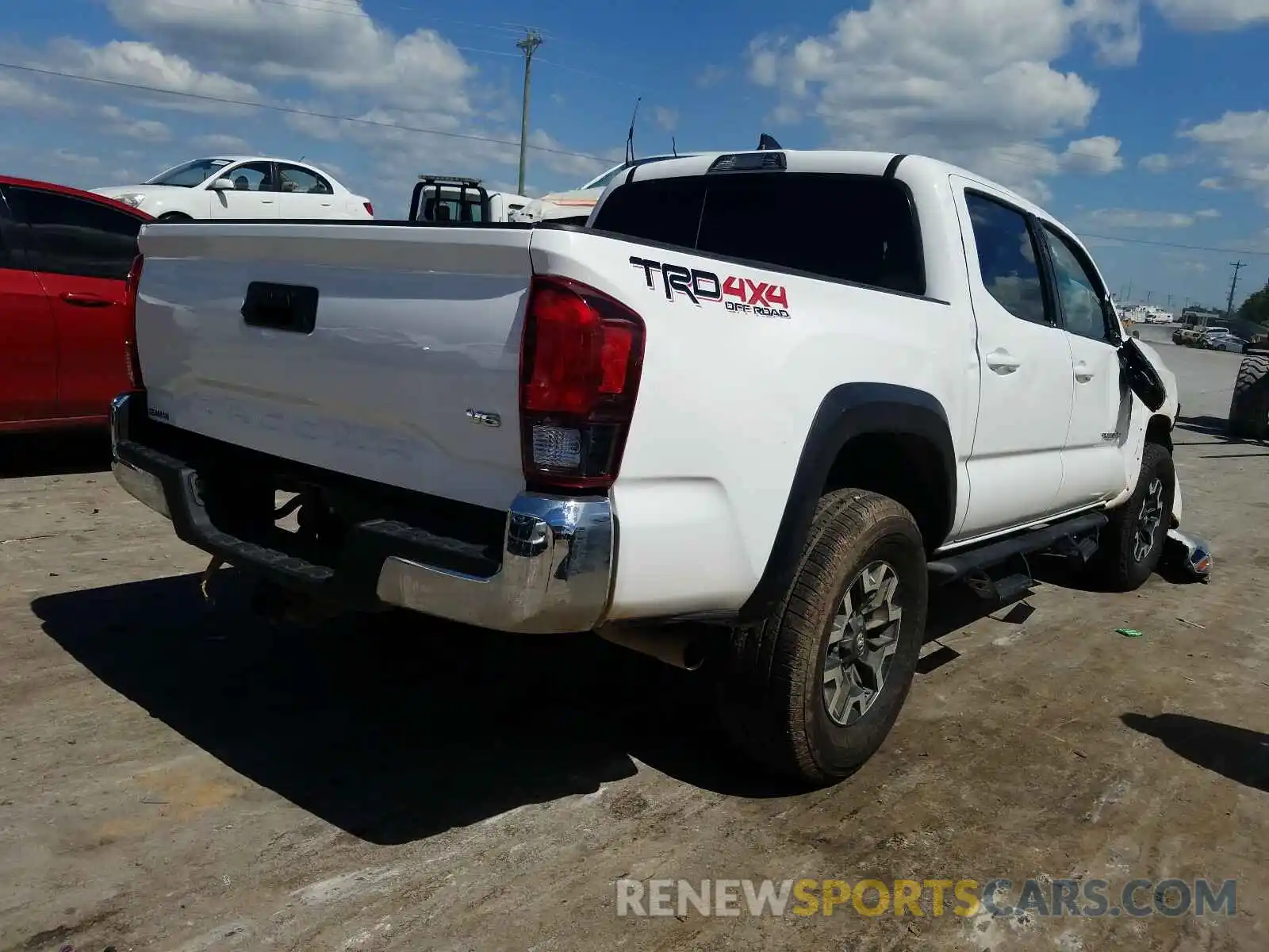 4 Photograph of a damaged car 5TFCZ5AN8KX210625 TOYOTA TACOMA 2019