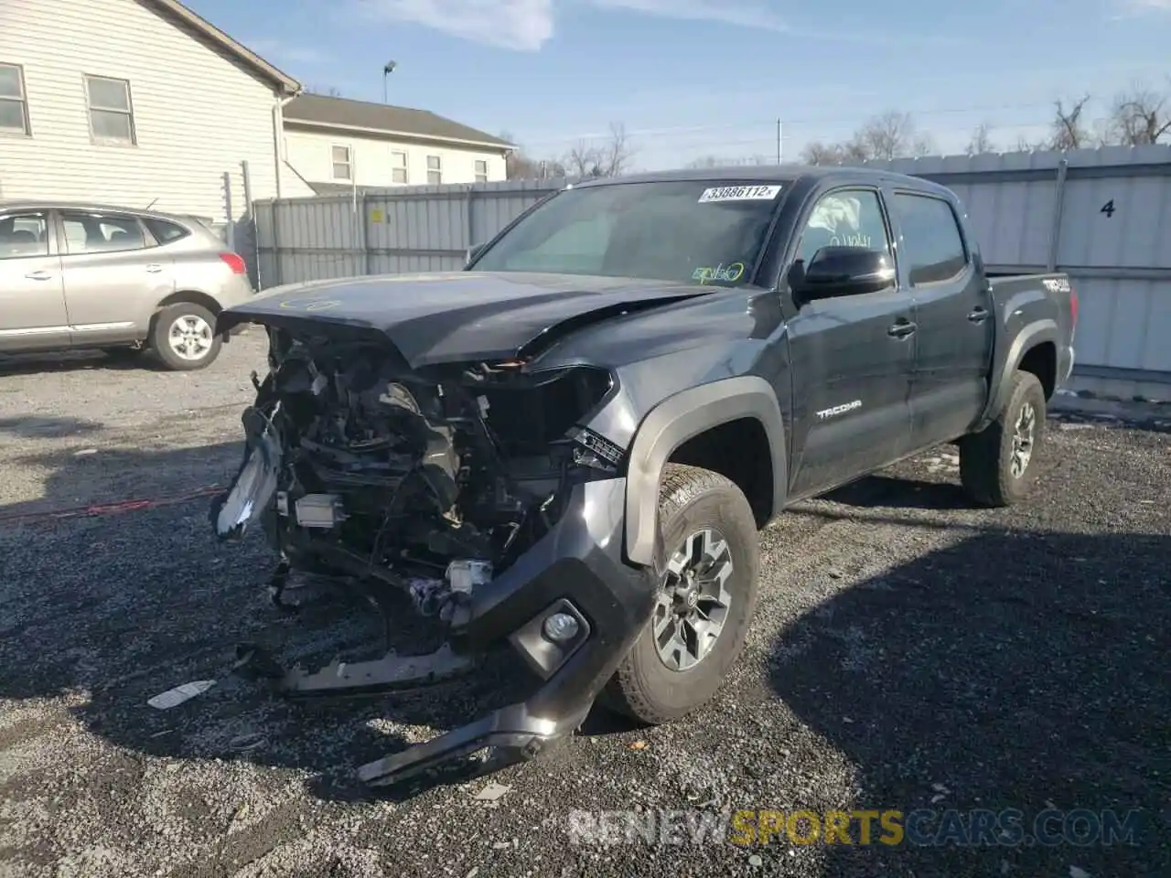 2 Photograph of a damaged car 5TFCZ5AN9KX169714 TOYOTA TACOMA 2019