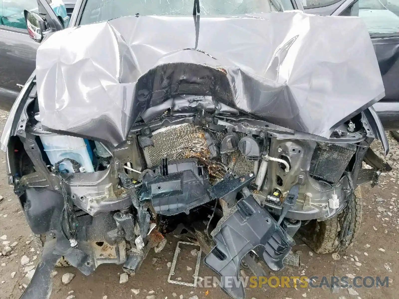 7 Photograph of a damaged car 5TFCZ5AN9KX171351 TOYOTA TACOMA 2019