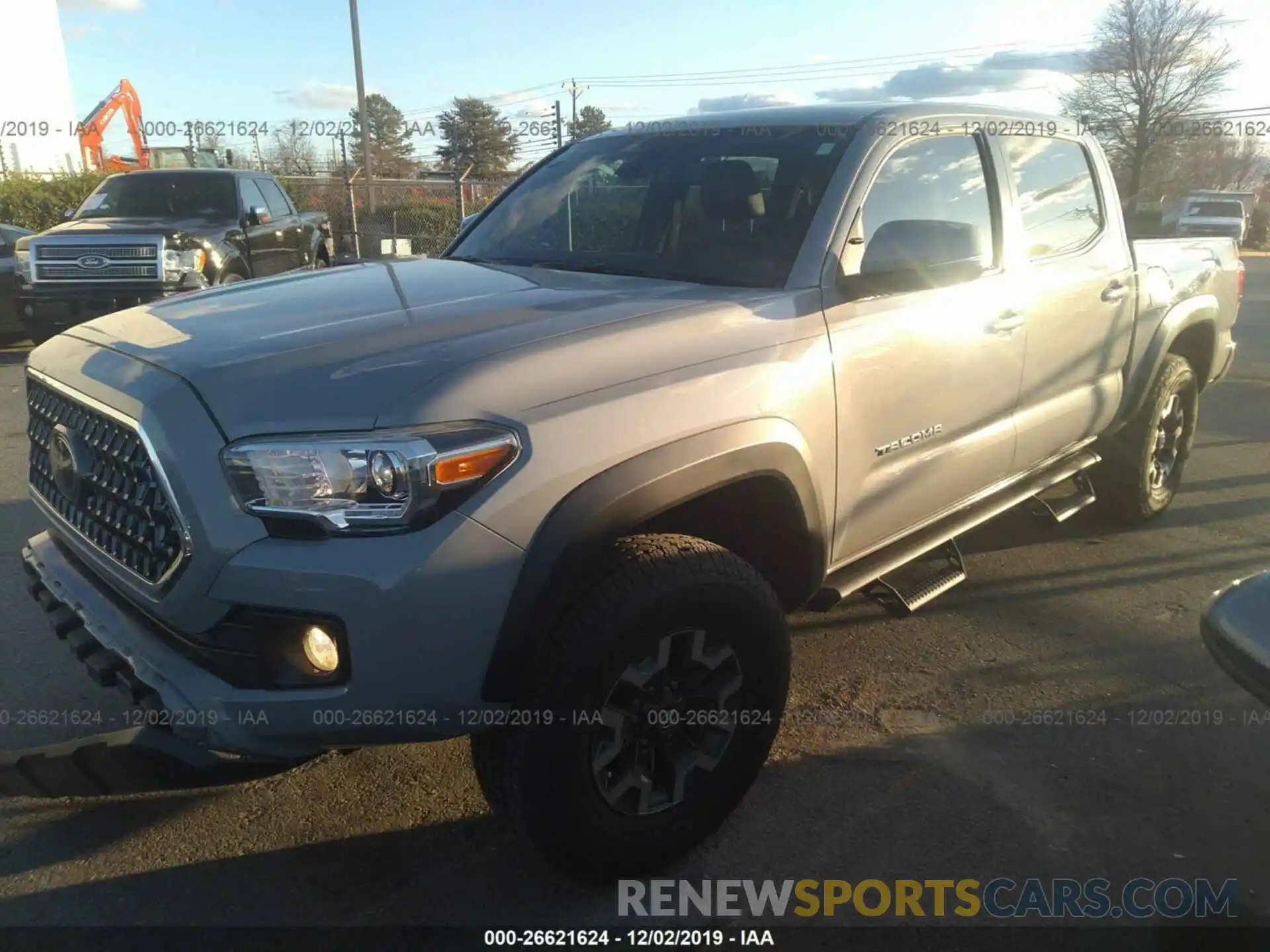 2 Photograph of a damaged car 5TFCZ5AN9KX172127 TOYOTA TACOMA 2019