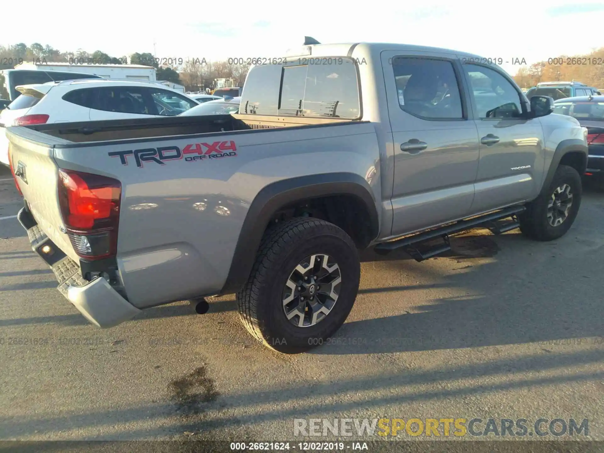 4 Photograph of a damaged car 5TFCZ5AN9KX172127 TOYOTA TACOMA 2019