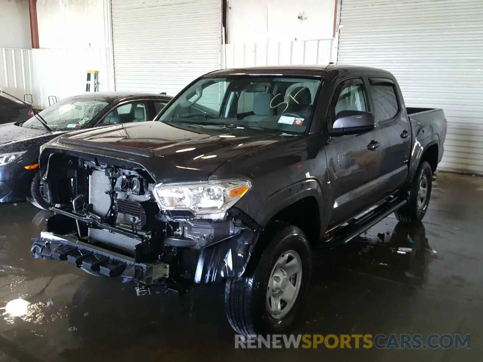 2 Photograph of a damaged car 5TFCZ5AN9KX173892 TOYOTA TACOMA 2019