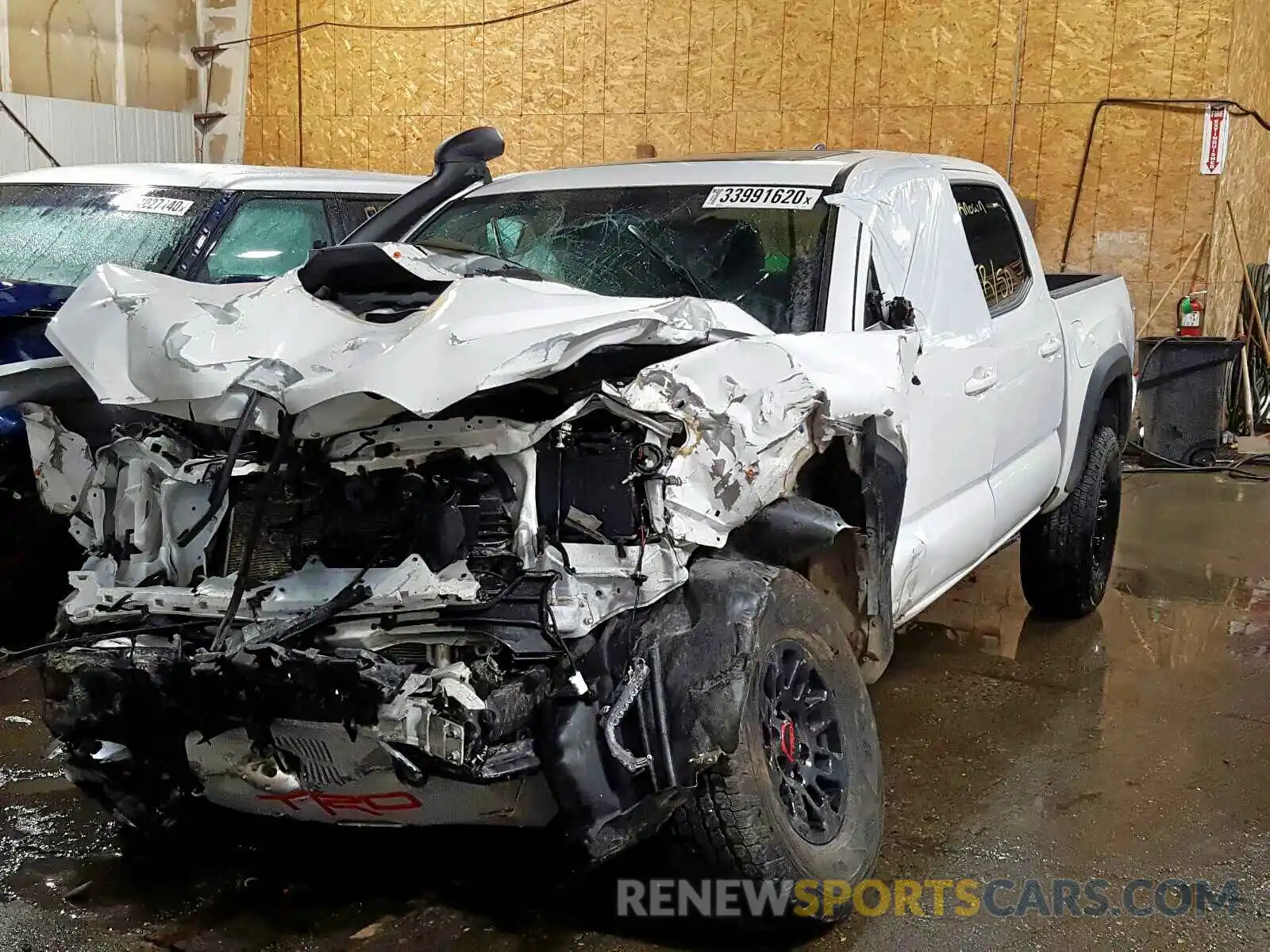 2 Photograph of a damaged car 5TFCZ5AN9KX174041 TOYOTA TACOMA 2019