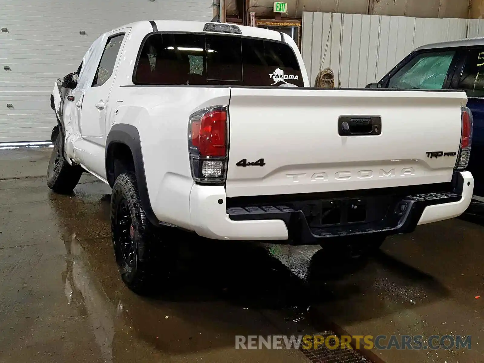 3 Photograph of a damaged car 5TFCZ5AN9KX174041 TOYOTA TACOMA 2019