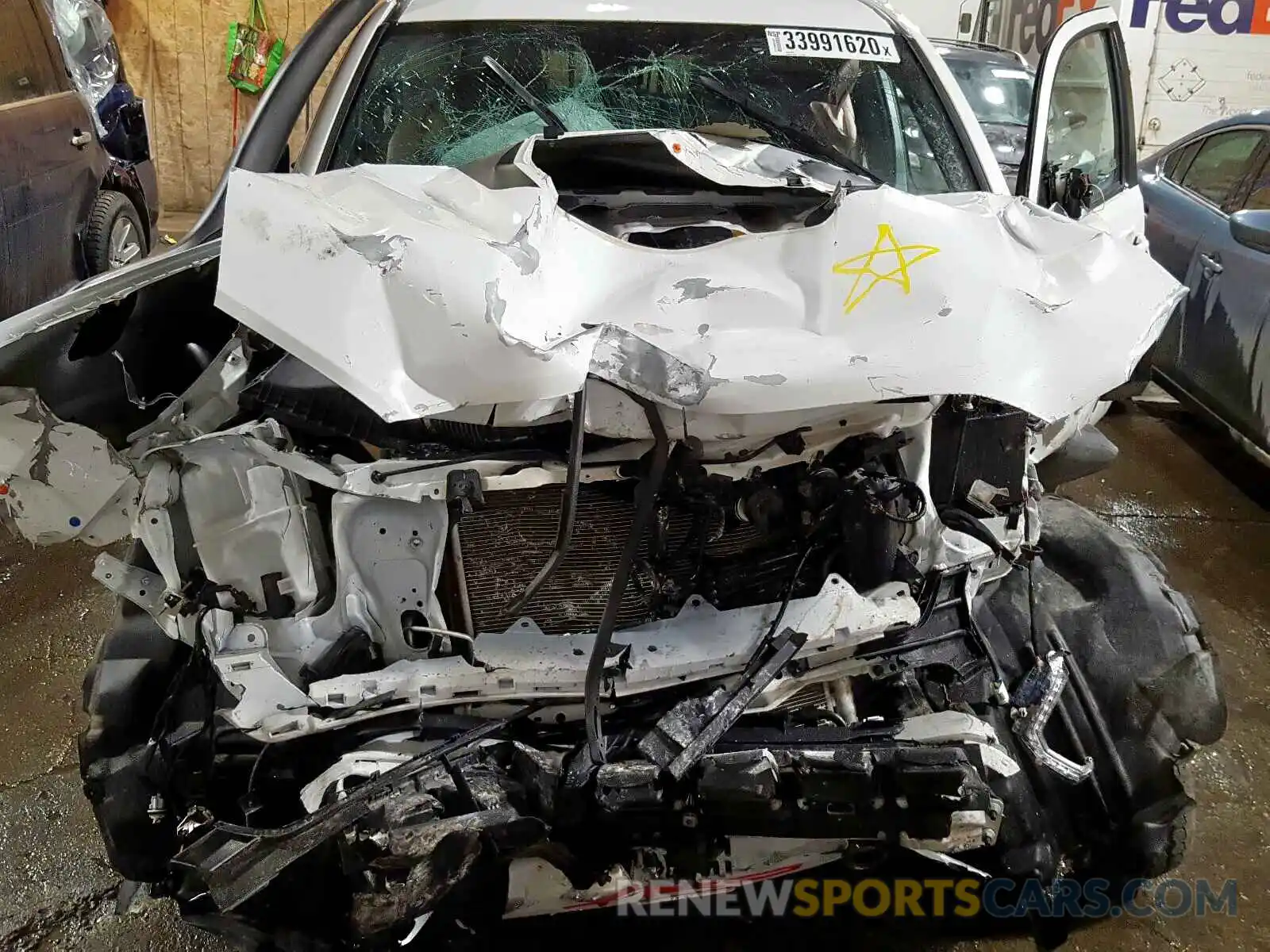 7 Photograph of a damaged car 5TFCZ5AN9KX174041 TOYOTA TACOMA 2019