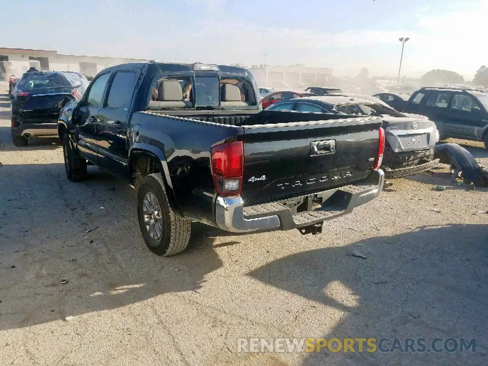 3 Photograph of a damaged car 5TFCZ5AN9KX174119 TOYOTA TACOMA 2019