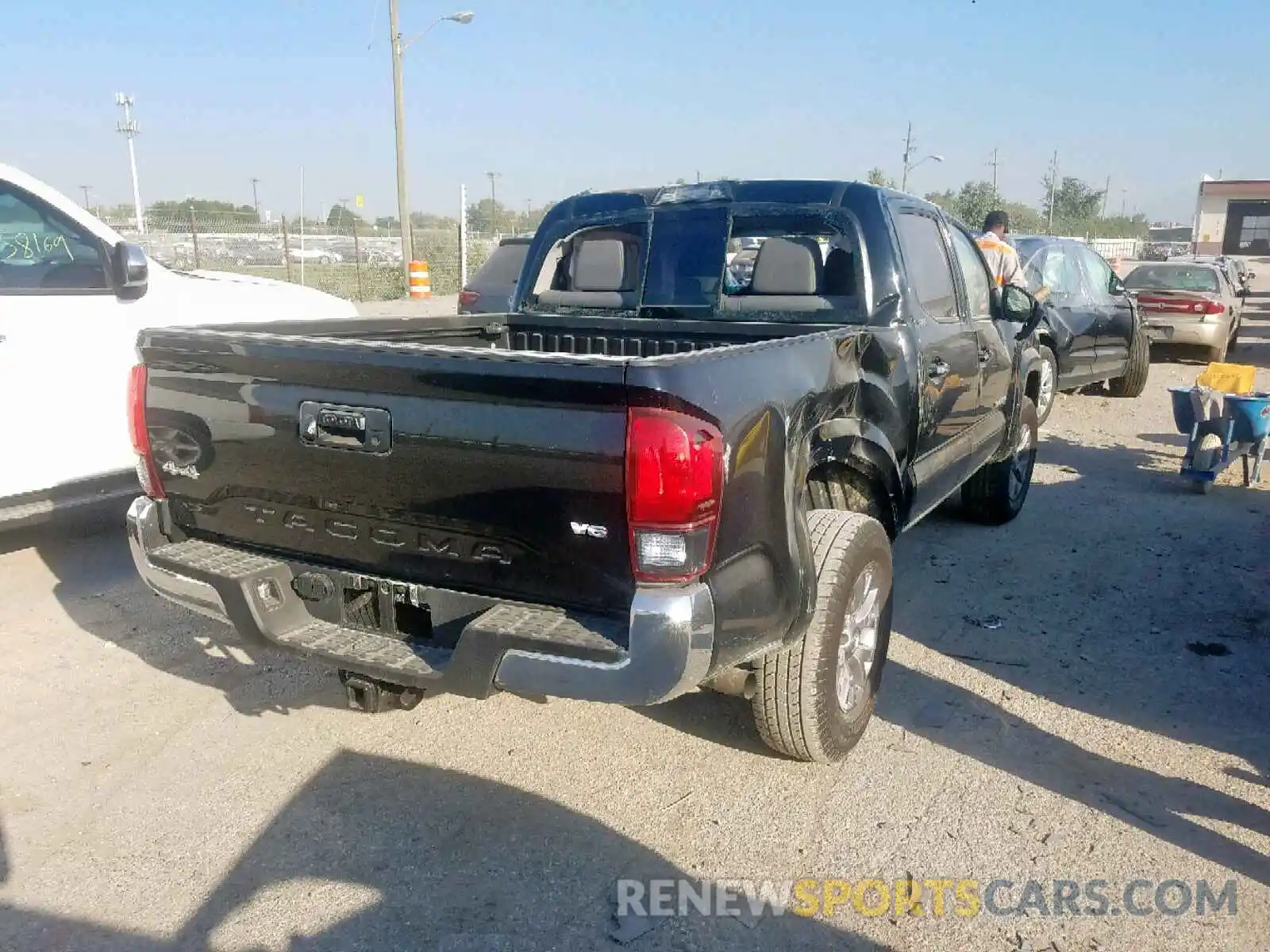 4 Photograph of a damaged car 5TFCZ5AN9KX174119 TOYOTA TACOMA 2019