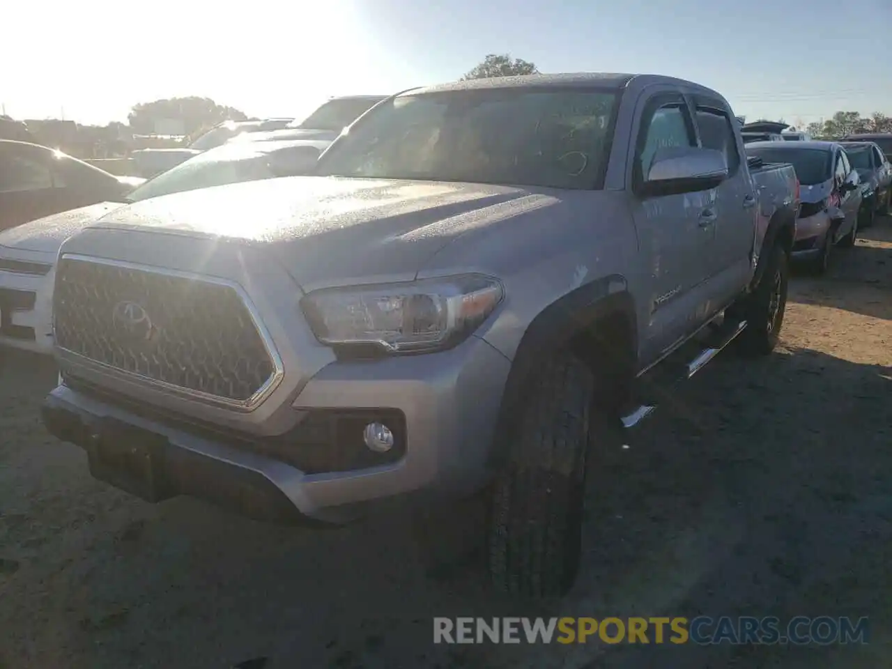 2 Photograph of a damaged car 5TFCZ5AN9KX176517 TOYOTA TACOMA 2019