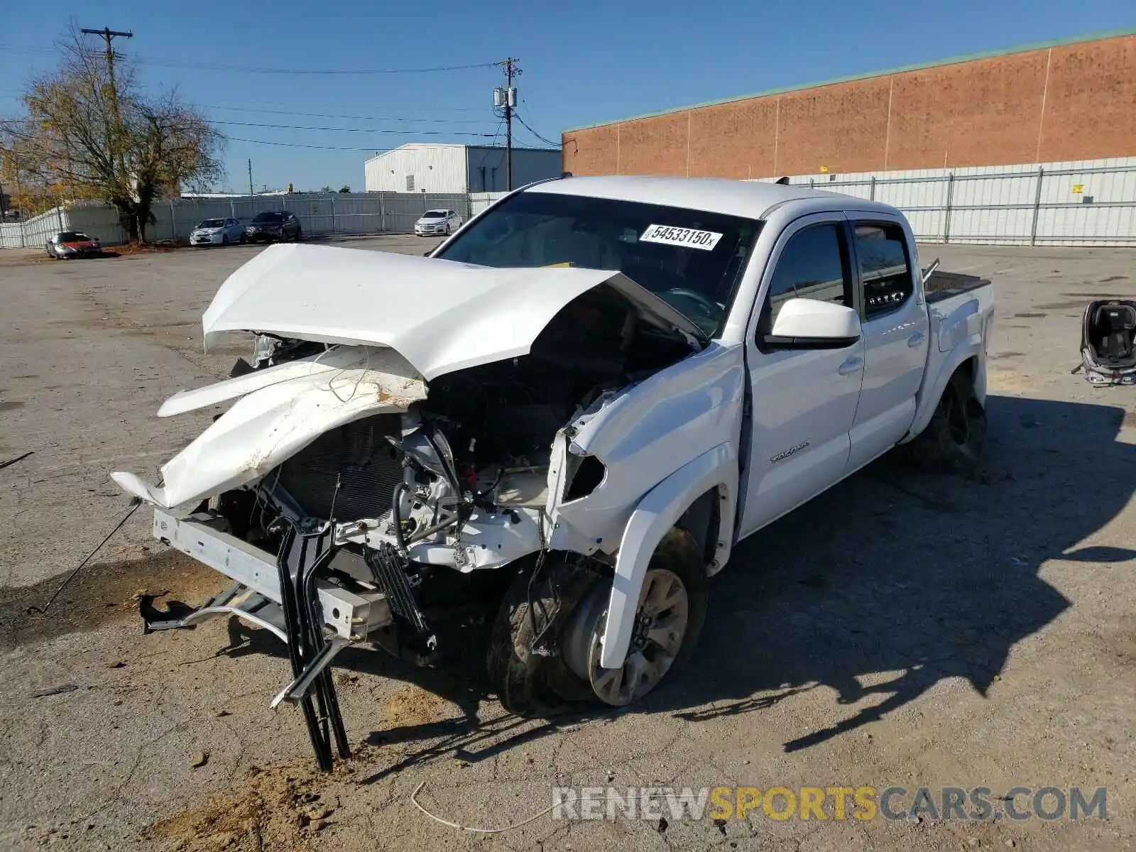 2 Photograph of a damaged car 5TFCZ5AN9KX180146 TOYOTA TACOMA 2019