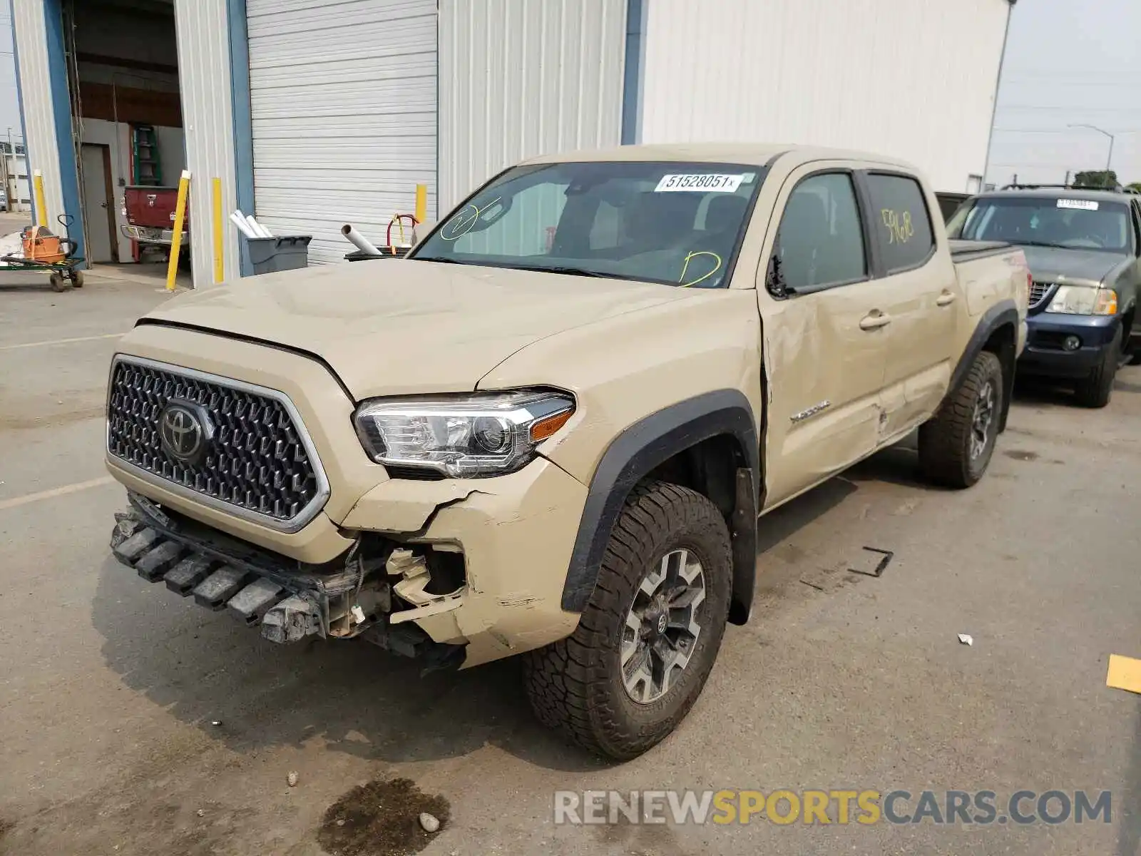 2 Photograph of a damaged car 5TFCZ5AN9KX180745 TOYOTA TACOMA 2019