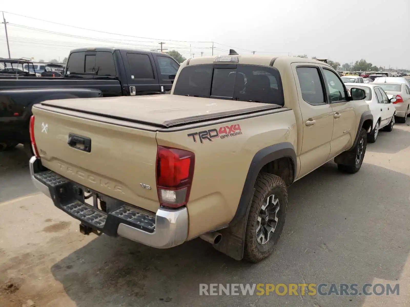 4 Photograph of a damaged car 5TFCZ5AN9KX180745 TOYOTA TACOMA 2019