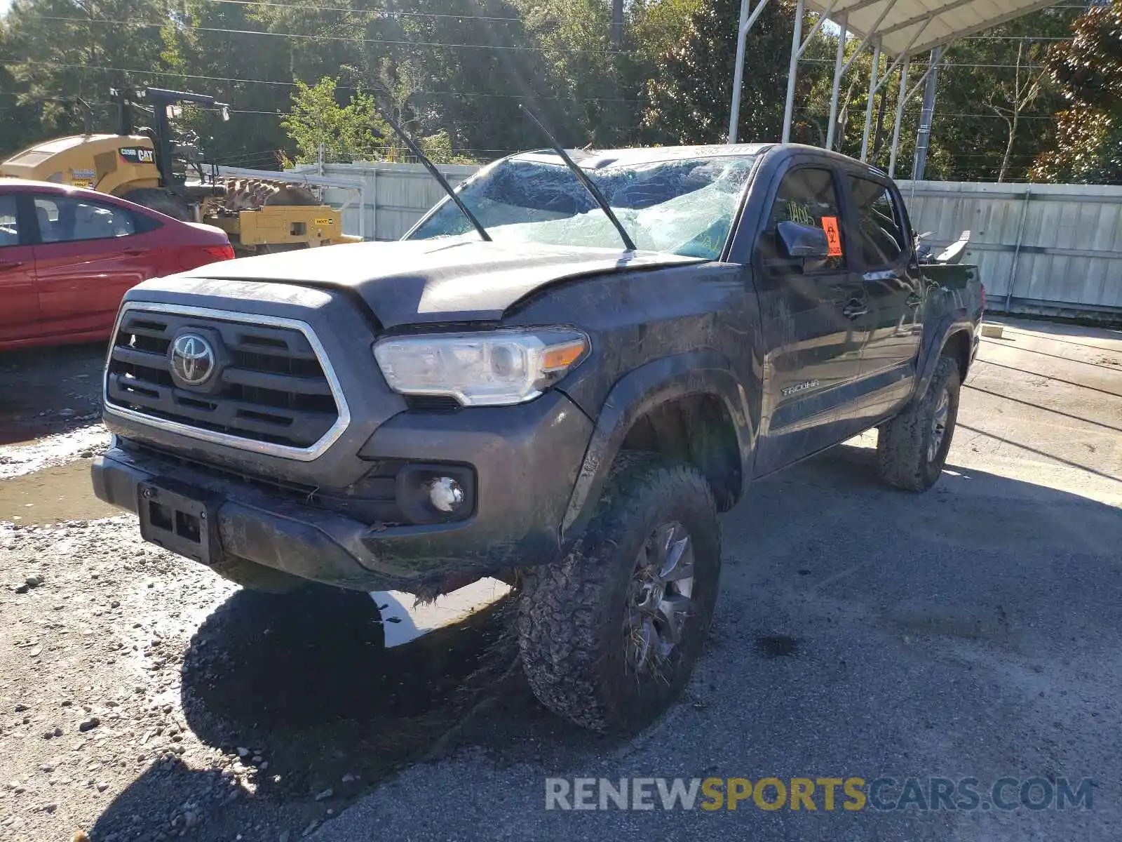 2 Photograph of a damaged car 5TFCZ5AN9KX182169 TOYOTA TACOMA 2019