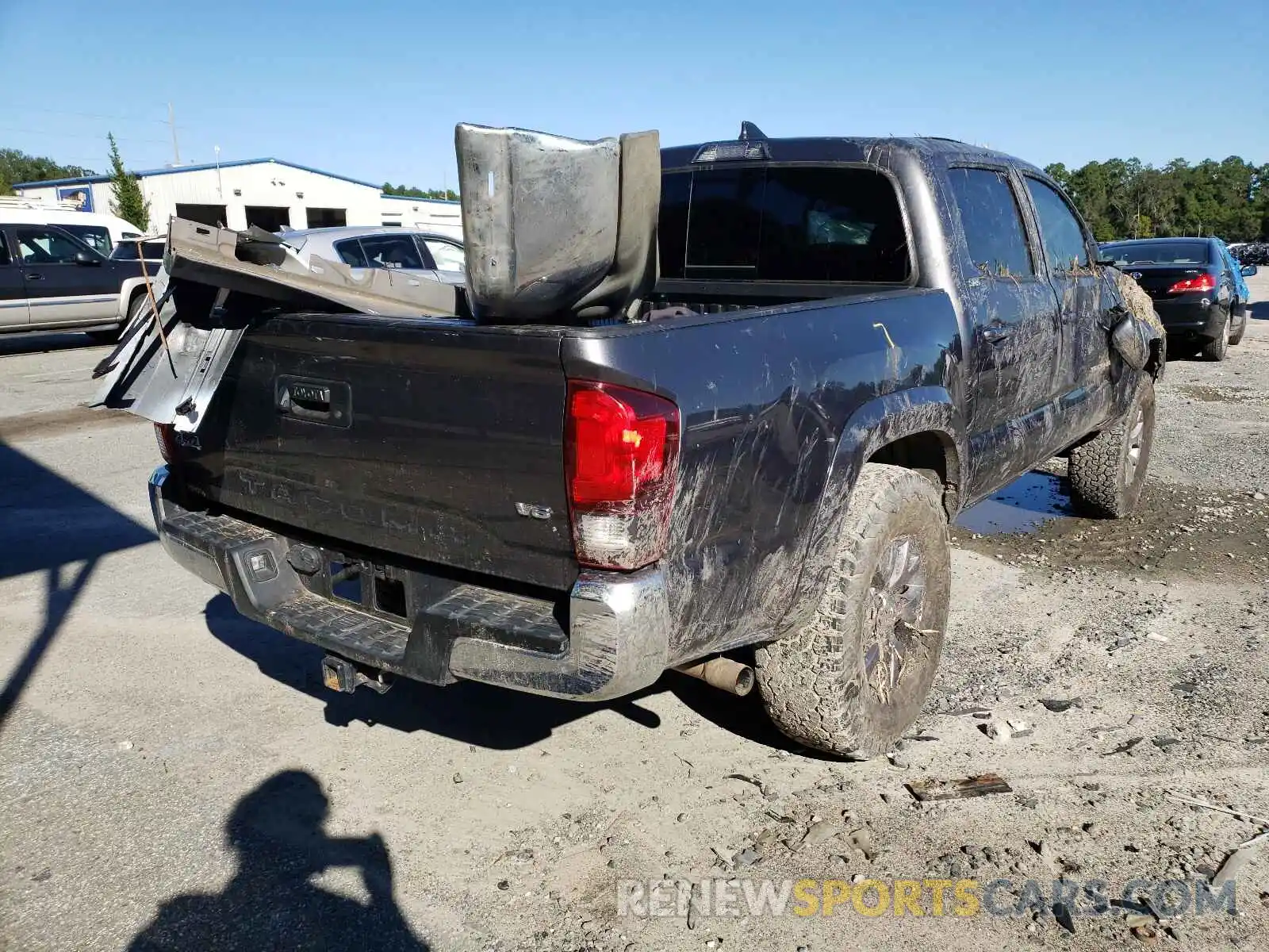 4 Photograph of a damaged car 5TFCZ5AN9KX182169 TOYOTA TACOMA 2019