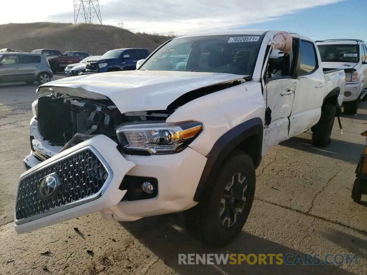 2 Photograph of a damaged car 5TFCZ5AN9KX184021 TOYOTA TACOMA 2019