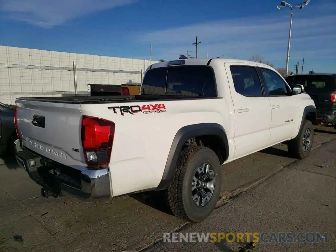 4 Photograph of a damaged car 5TFCZ5AN9KX184021 TOYOTA TACOMA 2019