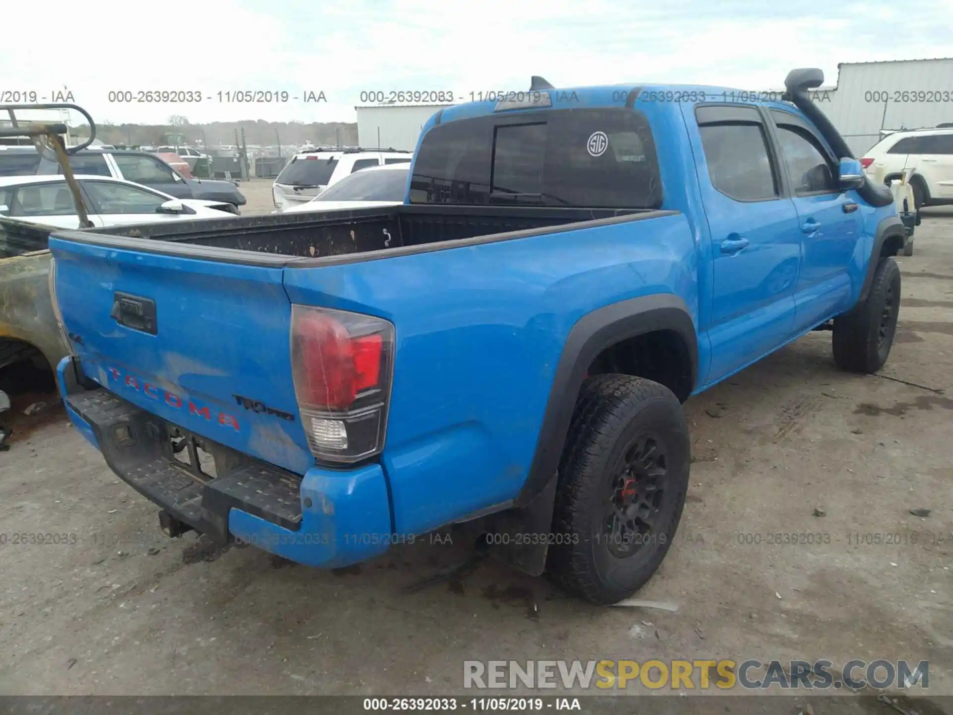 4 Photograph of a damaged car 5TFCZ5AN9KX184133 TOYOTA TACOMA 2019