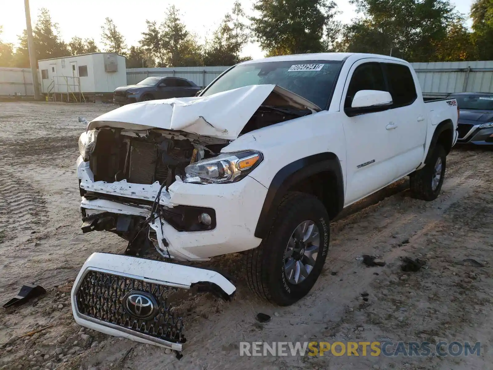 2 Photograph of a damaged car 5TFCZ5AN9KX186528 TOYOTA TACOMA 2019