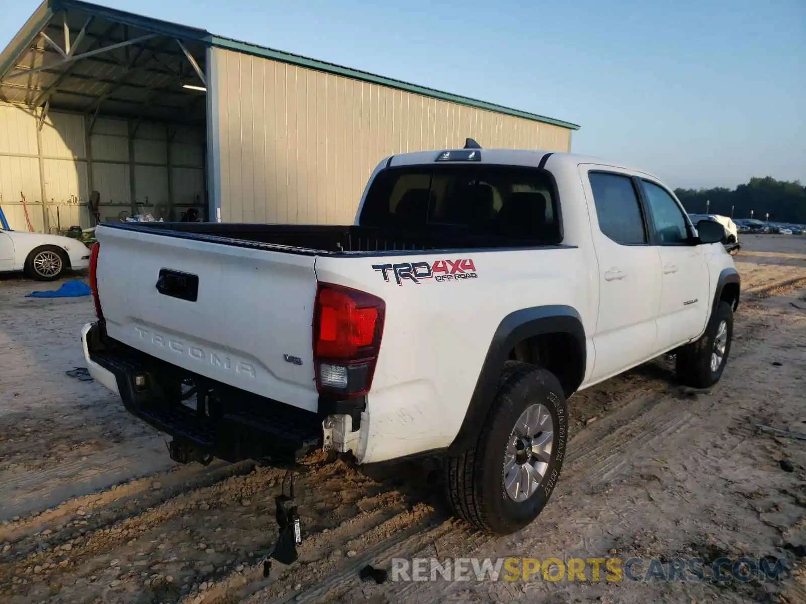 4 Photograph of a damaged car 5TFCZ5AN9KX186528 TOYOTA TACOMA 2019