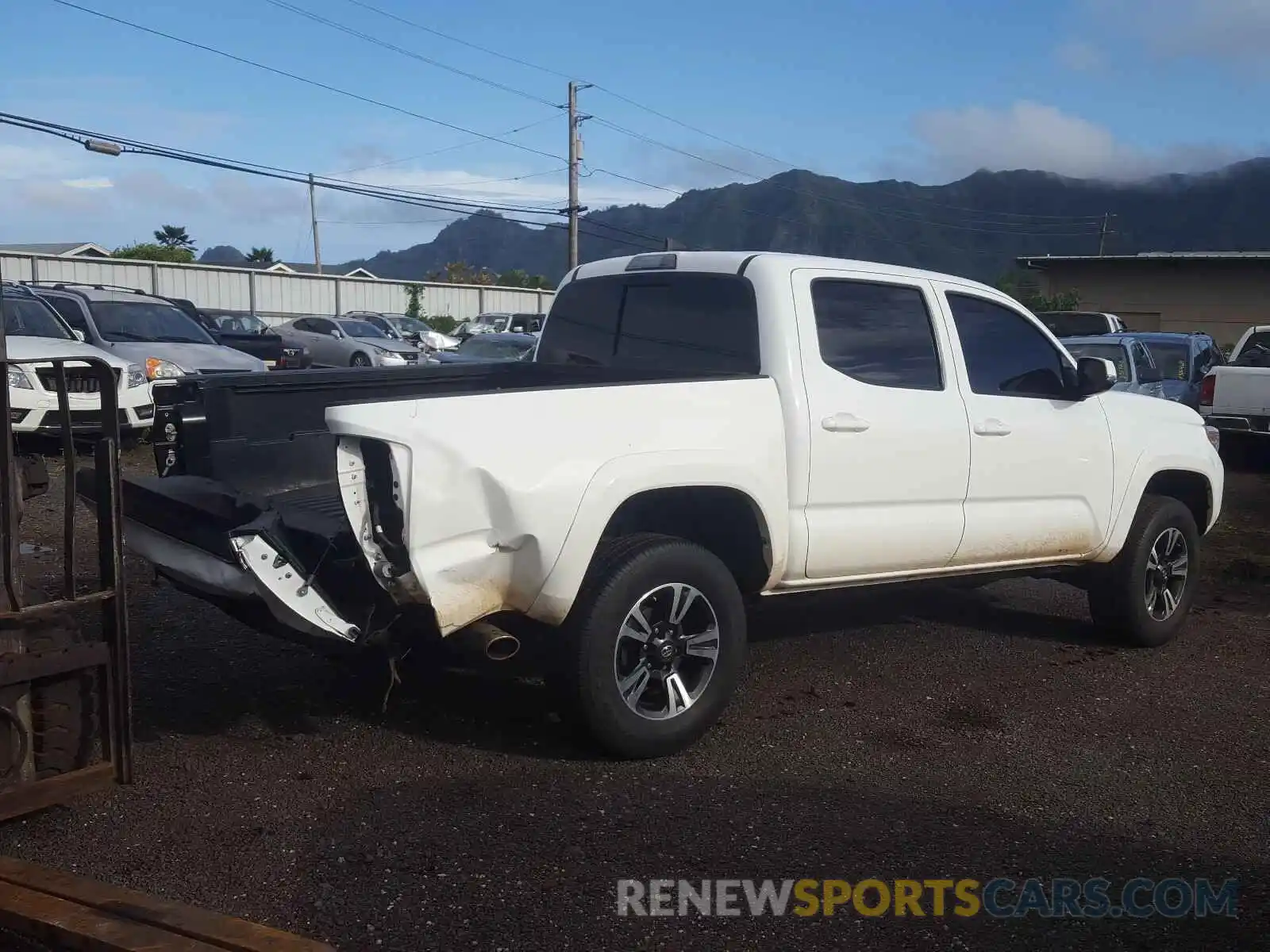 4 Photograph of a damaged car 5TFCZ5AN9KX186643 TOYOTA TACOMA 2019