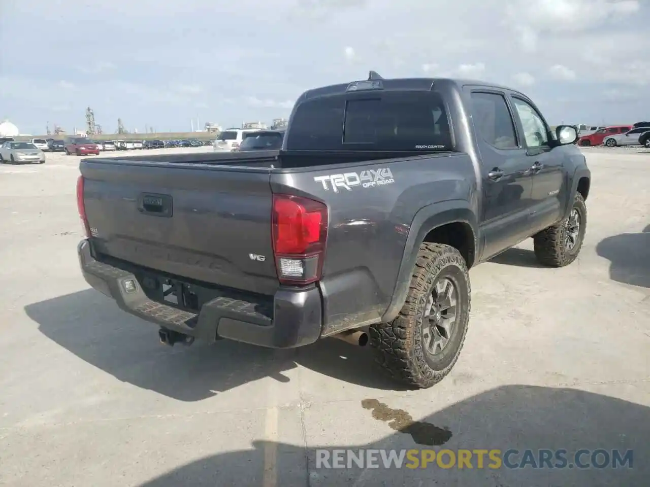 4 Photograph of a damaged car 5TFCZ5AN9KX186805 TOYOTA TACOMA 2019