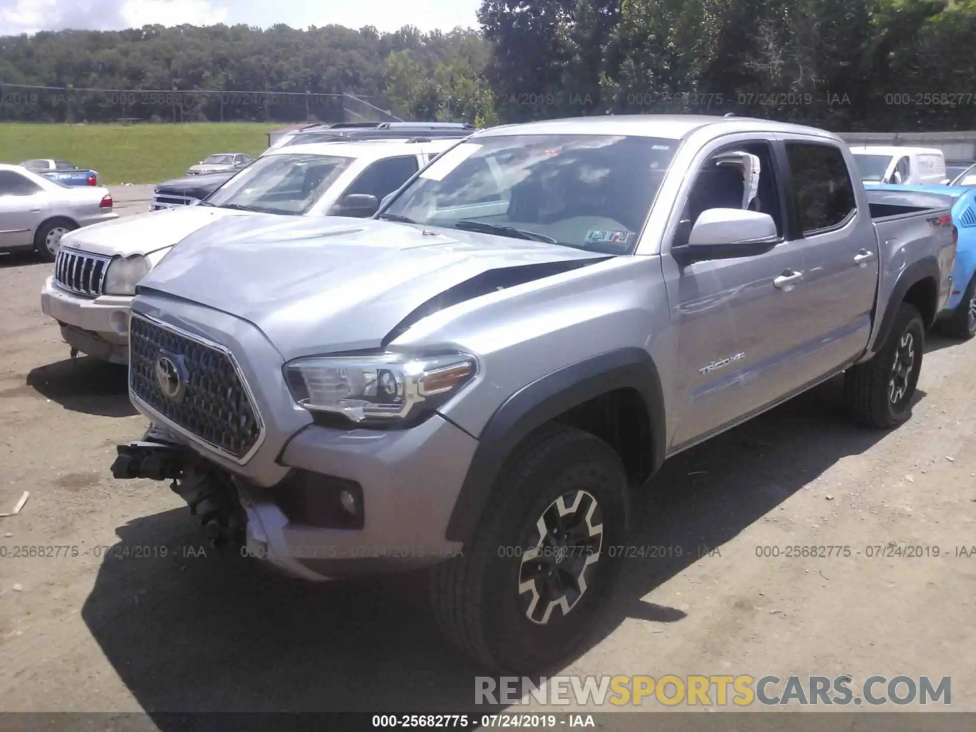 2 Photograph of a damaged car 5TFCZ5AN9KX190336 TOYOTA TACOMA 2019