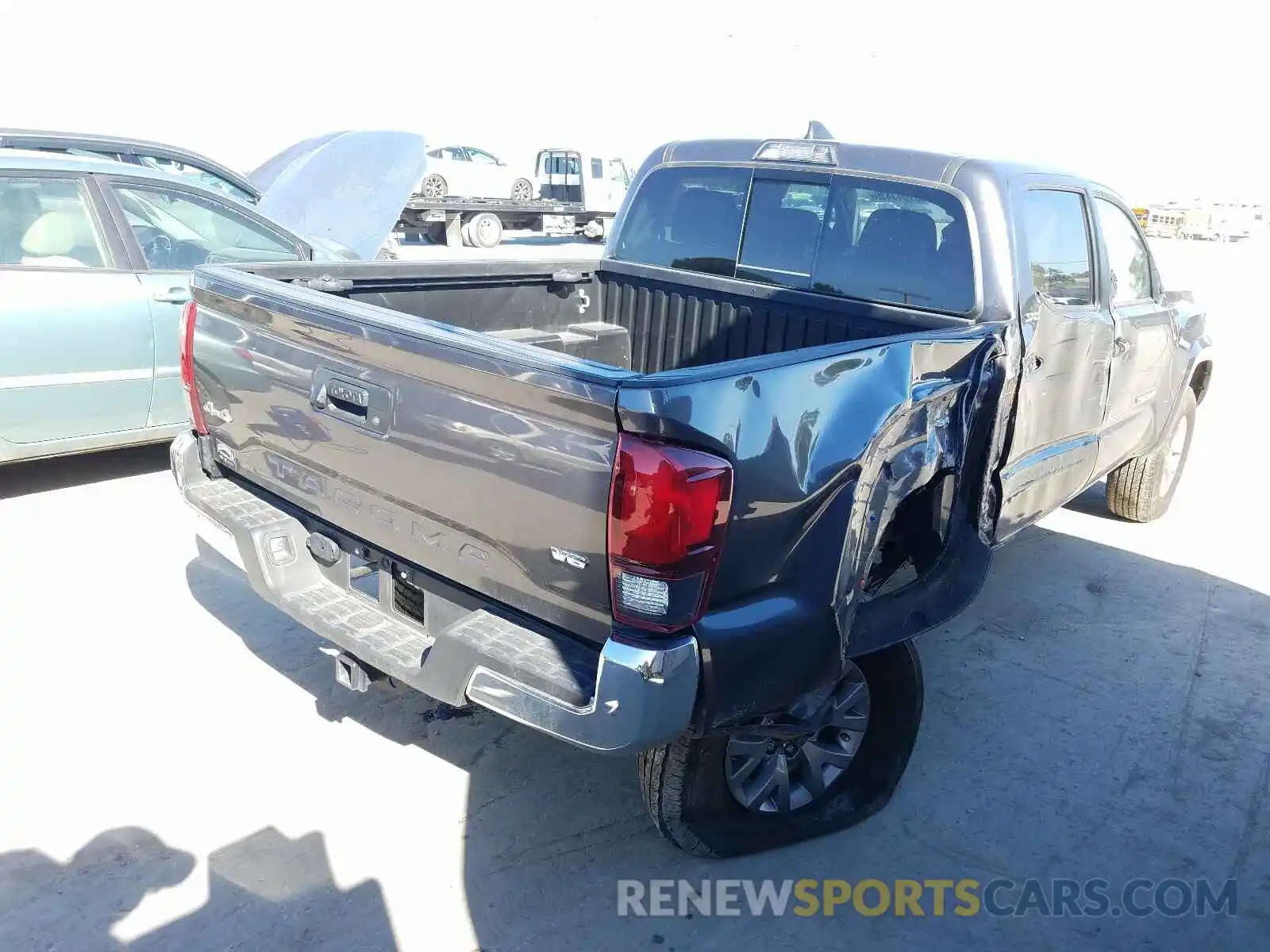 4 Photograph of a damaged car 5TFCZ5AN9KX192927 TOYOTA TACOMA 2019