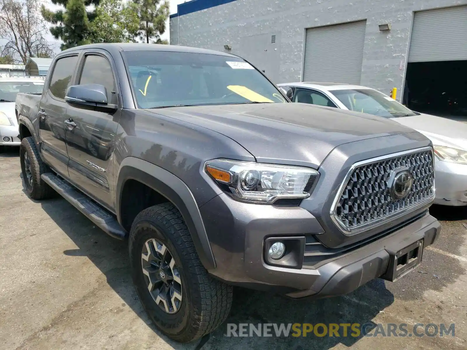 1 Photograph of a damaged car 5TFCZ5AN9KX194287 TOYOTA TACOMA 2019