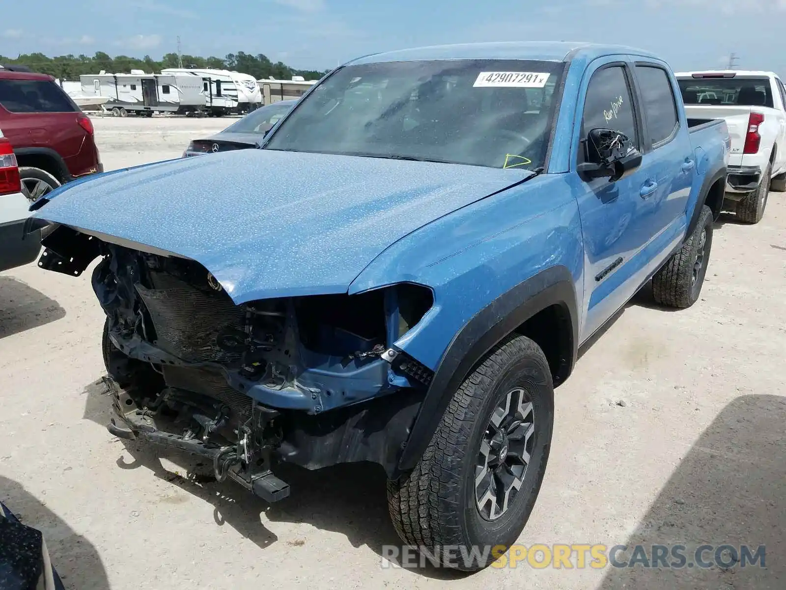 2 Photograph of a damaged car 5TFCZ5AN9KX194841 TOYOTA TACOMA 2019