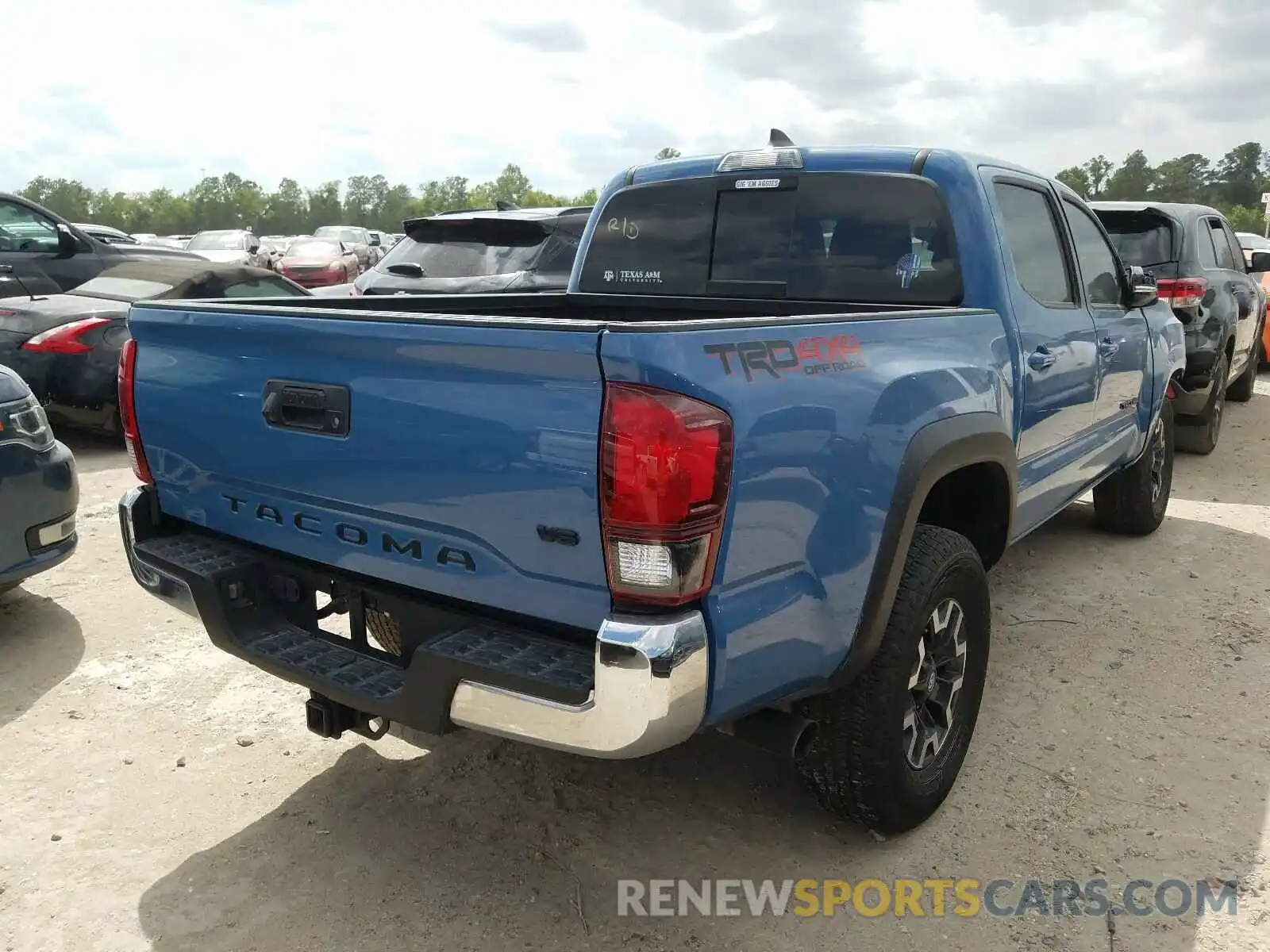 4 Photograph of a damaged car 5TFCZ5AN9KX194841 TOYOTA TACOMA 2019