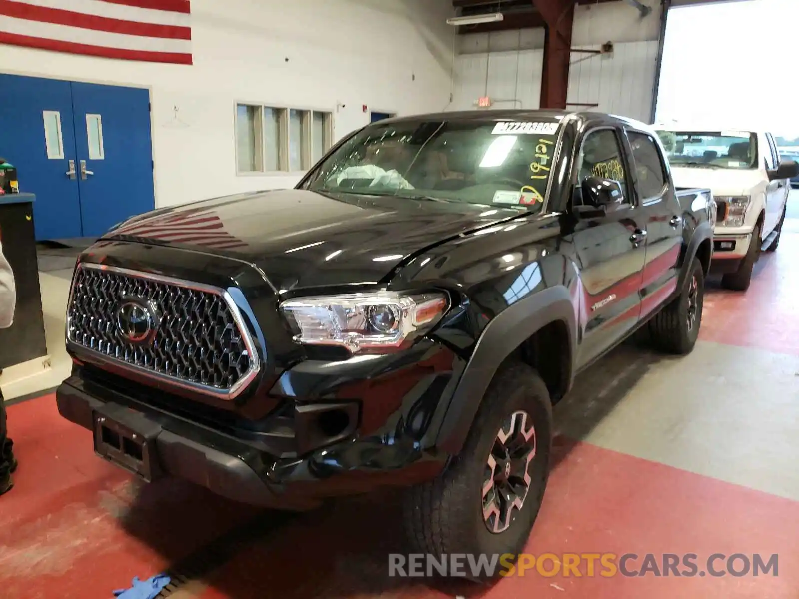 2 Photograph of a damaged car 5TFCZ5AN9KX195472 TOYOTA TACOMA 2019