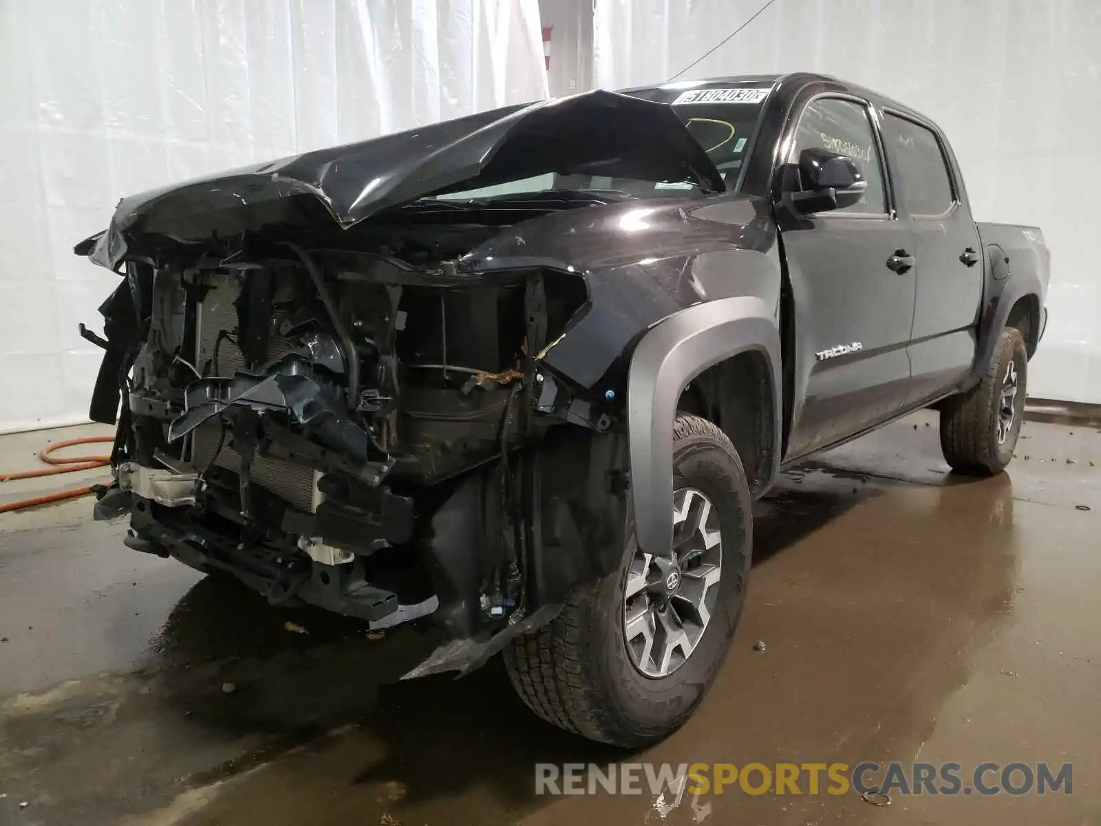 2 Photograph of a damaged car 5TFCZ5AN9KX195780 TOYOTA TACOMA 2019