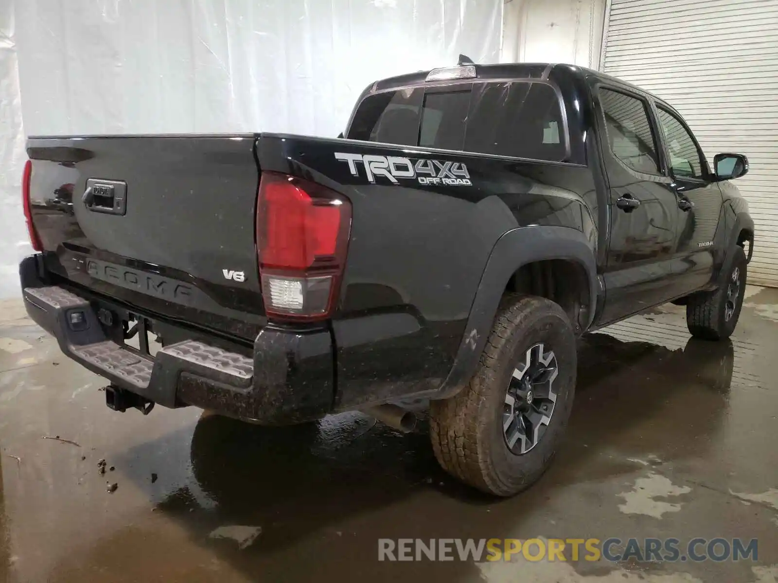 4 Photograph of a damaged car 5TFCZ5AN9KX195780 TOYOTA TACOMA 2019