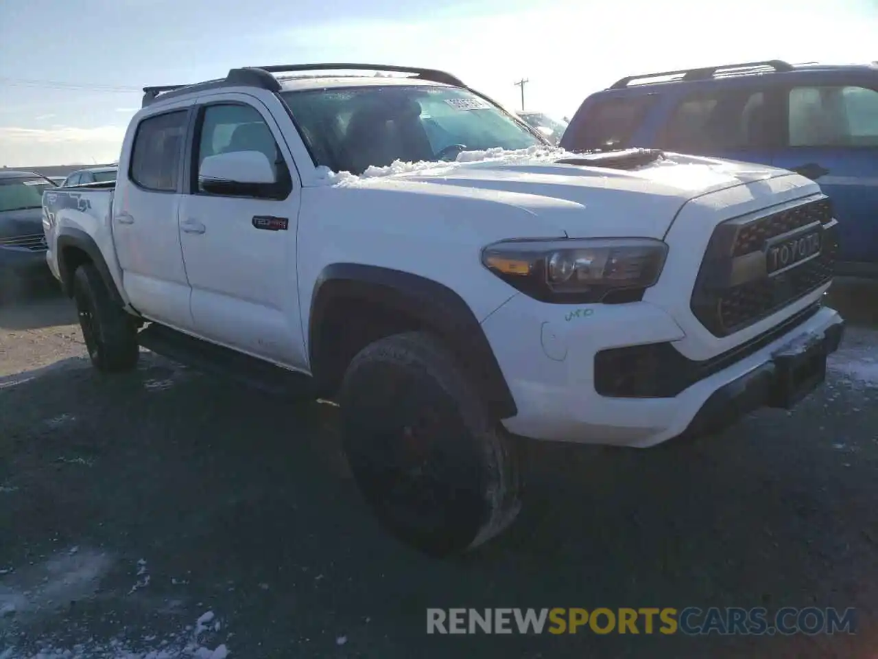 4 Photograph of a damaged car 5TFCZ5AN9KX196945 TOYOTA TACOMA 2019