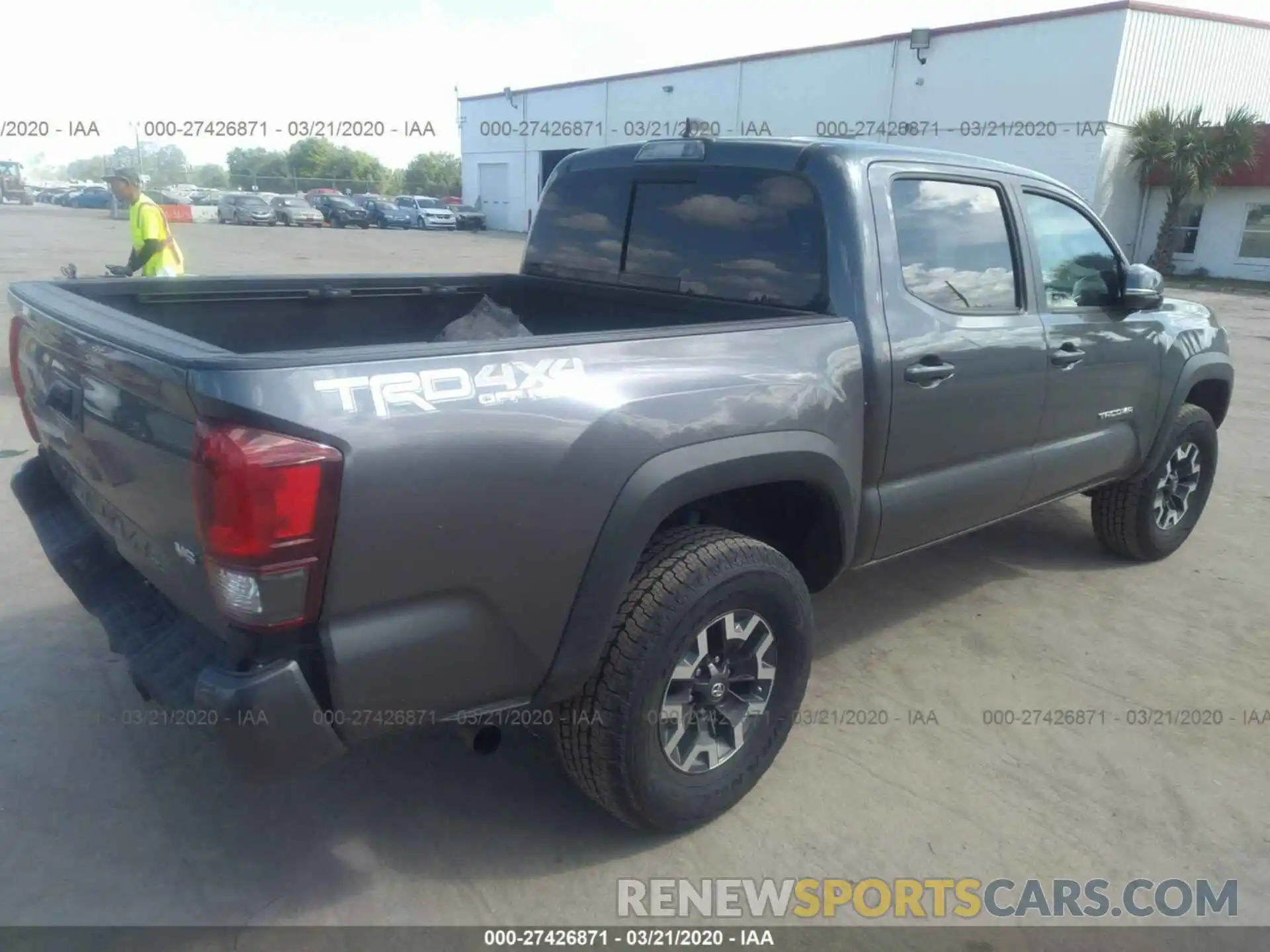 4 Photograph of a damaged car 5TFCZ5AN9KX197044 TOYOTA TACOMA 2019