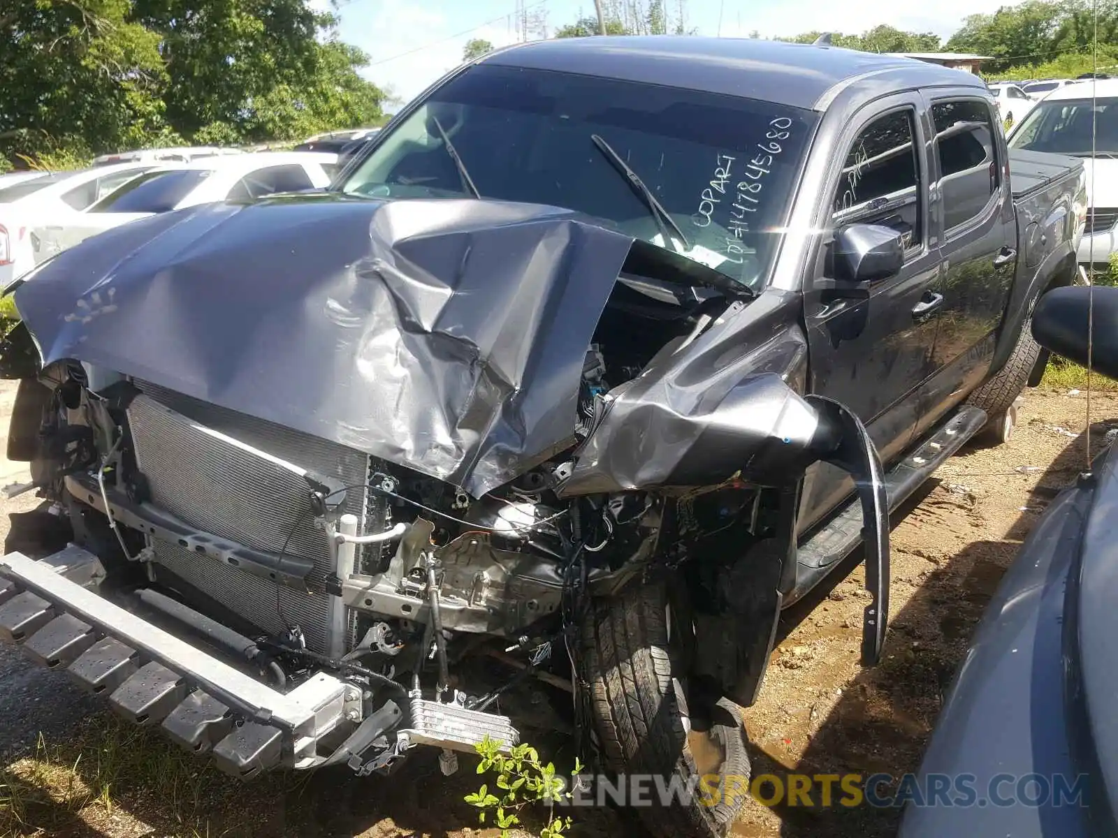 2 Photograph of a damaged car 5TFCZ5AN9KX197951 TOYOTA TACOMA 2019