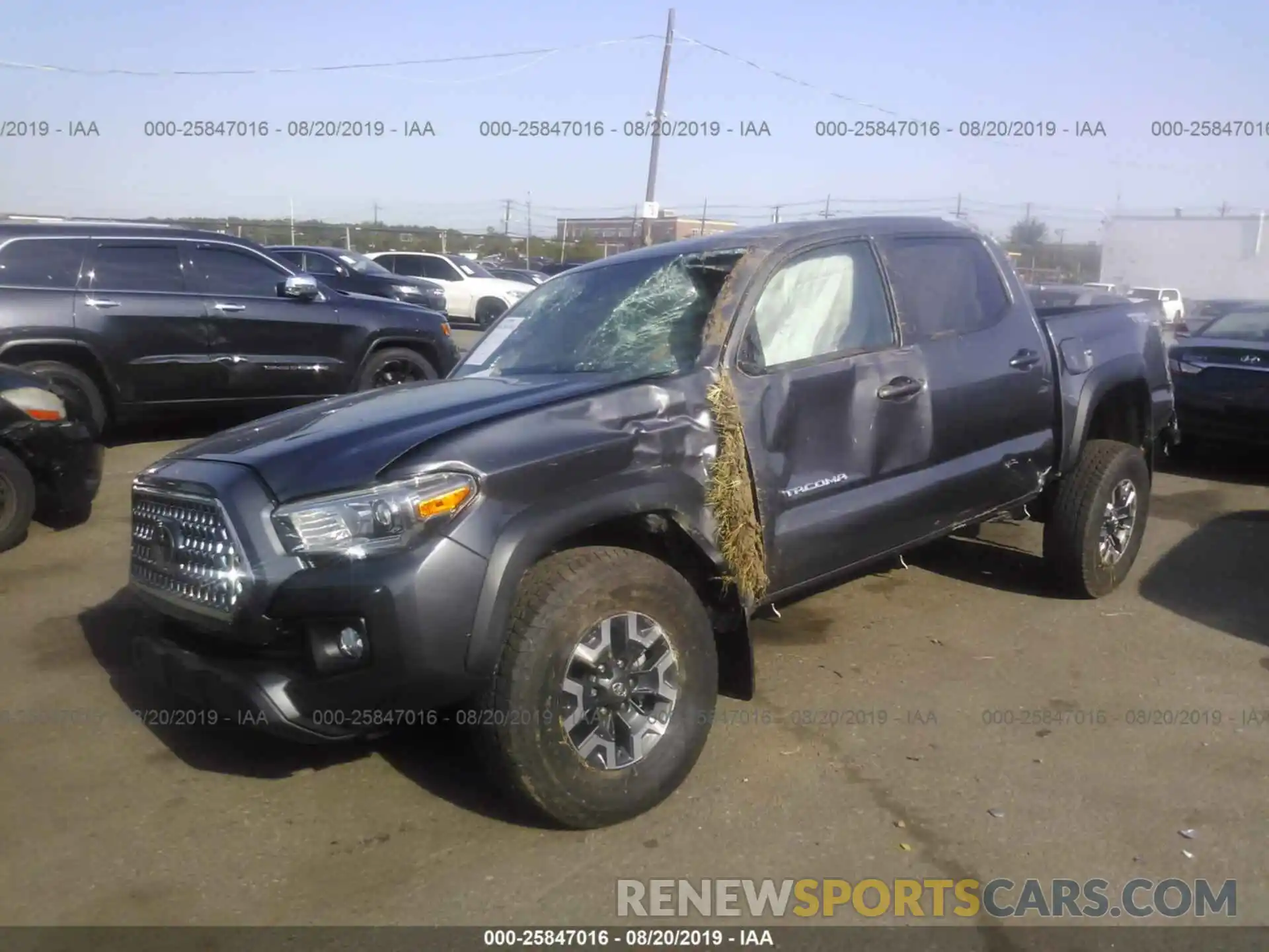 2 Photograph of a damaged car 5TFCZ5AN9KX198730 TOYOTA TACOMA 2019