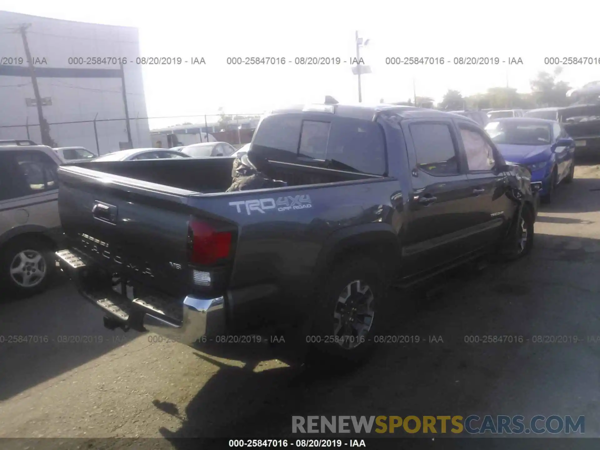 4 Photograph of a damaged car 5TFCZ5AN9KX198730 TOYOTA TACOMA 2019