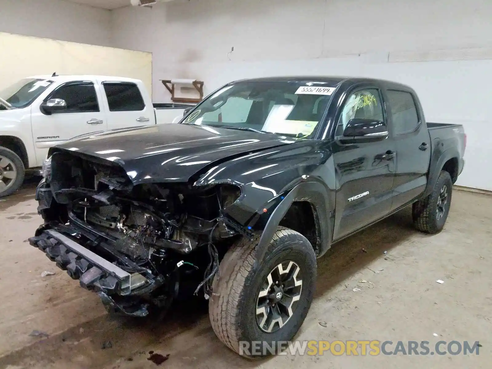 2 Photograph of a damaged car 5TFCZ5AN9KX199814 TOYOTA TACOMA 2019