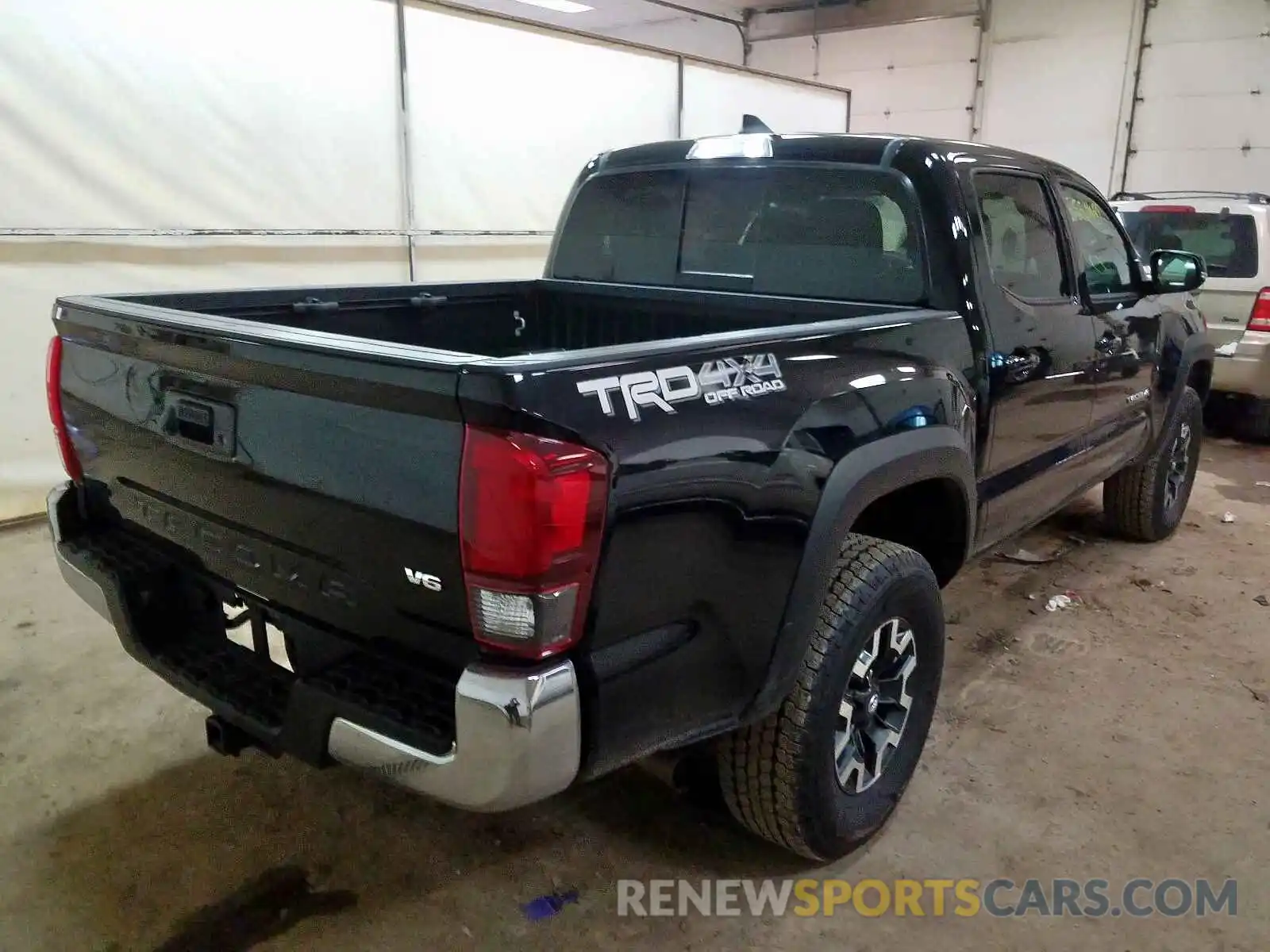 4 Photograph of a damaged car 5TFCZ5AN9KX199814 TOYOTA TACOMA 2019