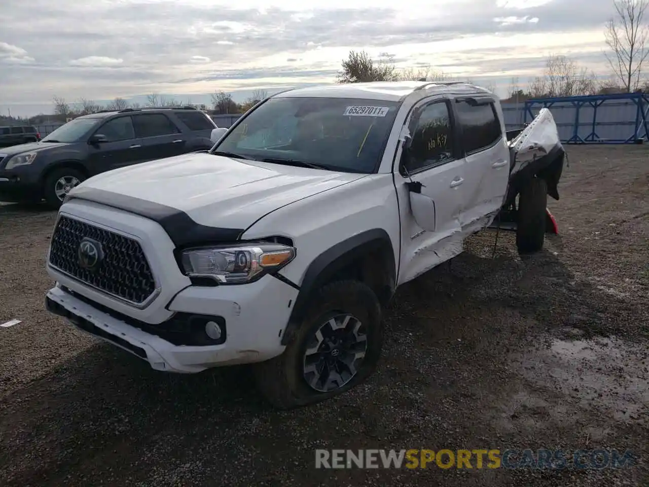 2 Photograph of a damaged car 5TFCZ5AN9KX205210 TOYOTA TACOMA 2019