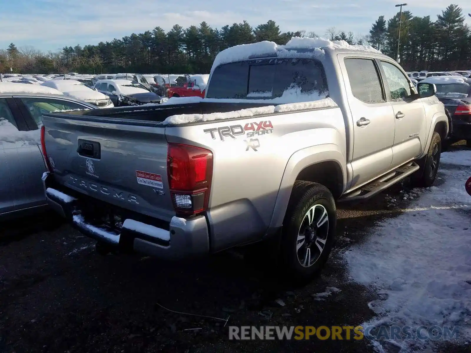 4 Photograph of a damaged car 5TFCZ5AN9KX207541 TOYOTA TACOMA 2019